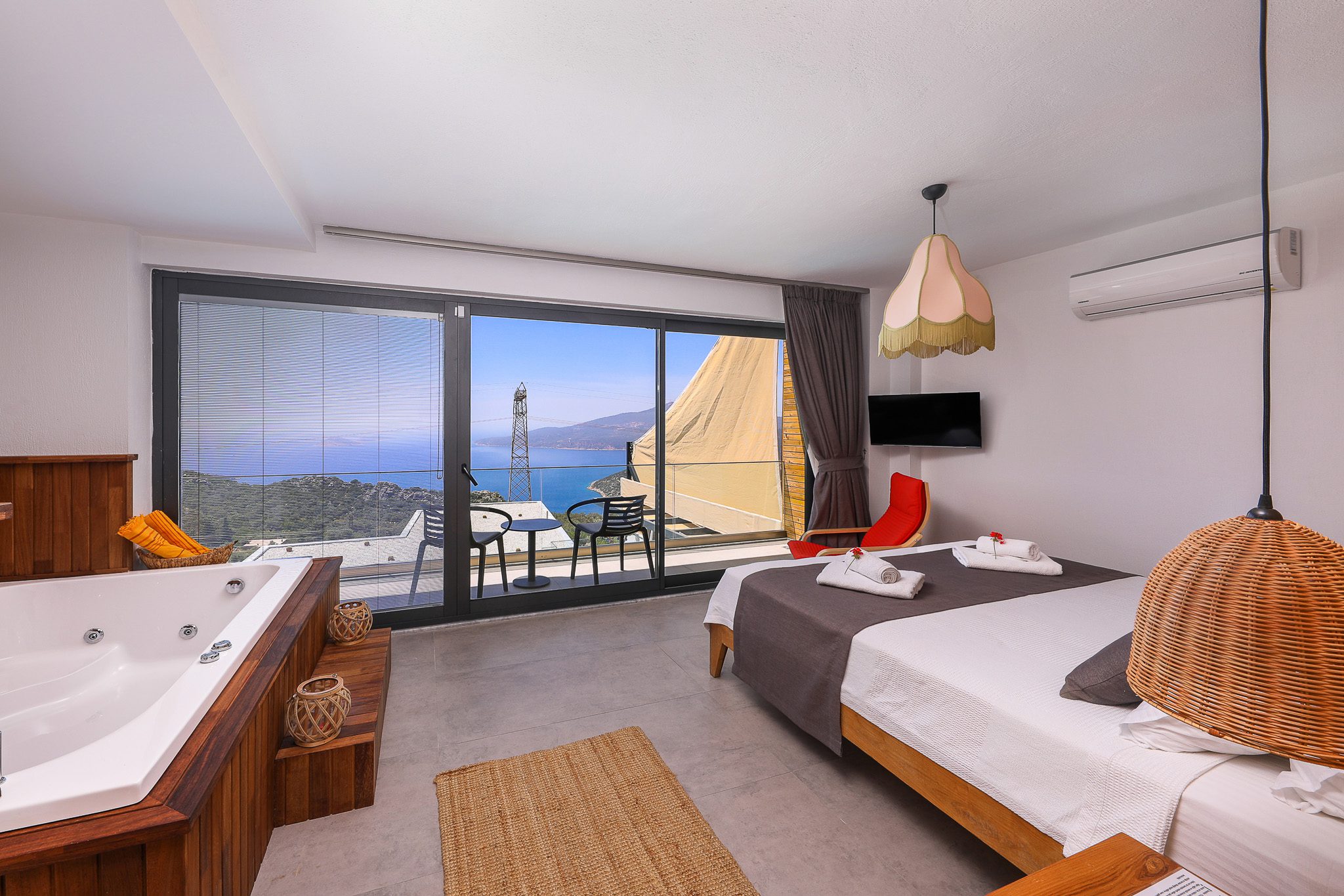 Double bedroom with balcony and hot tub in Villa Rosso, villa holidays in Kalkan, Turkey