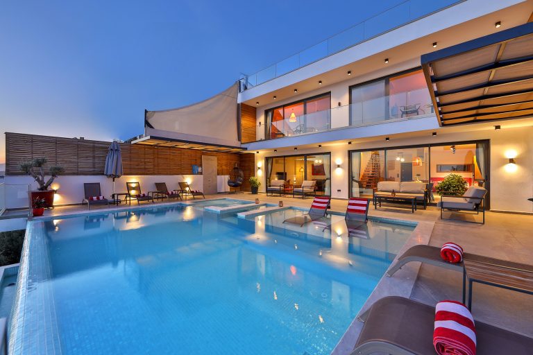 Outdoor pool and sun loungers in Villa Rosso, villa holidays in Kalkan, Turkey