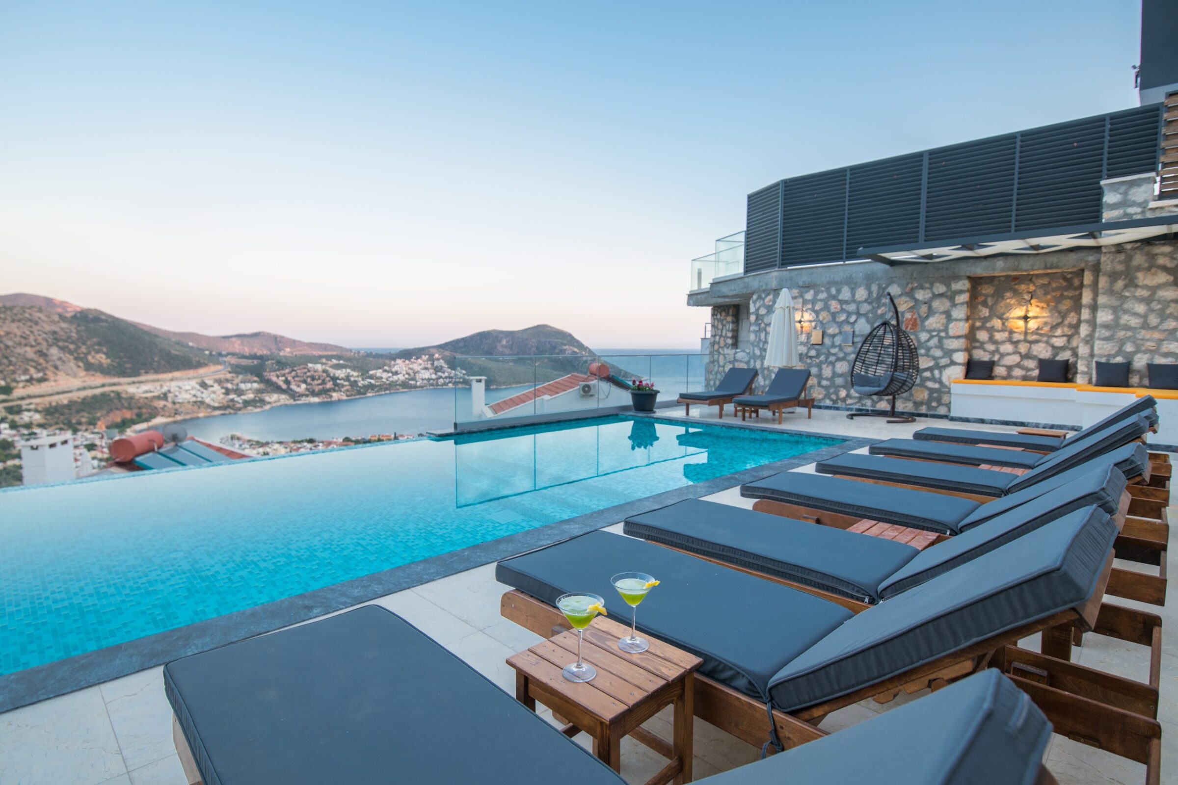 Outdoor infinity pool and sun loungers in Villa Unlimited 2, villa holidays in Kalkan, Turkey