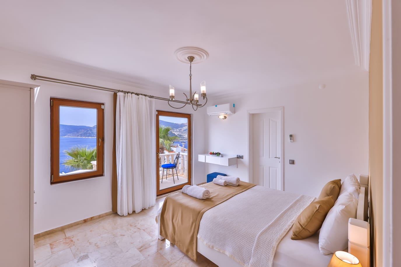 Double bedroom and bathroom with balcony access in Villa Palmiye, villa holidays in Kalkan, Turkey