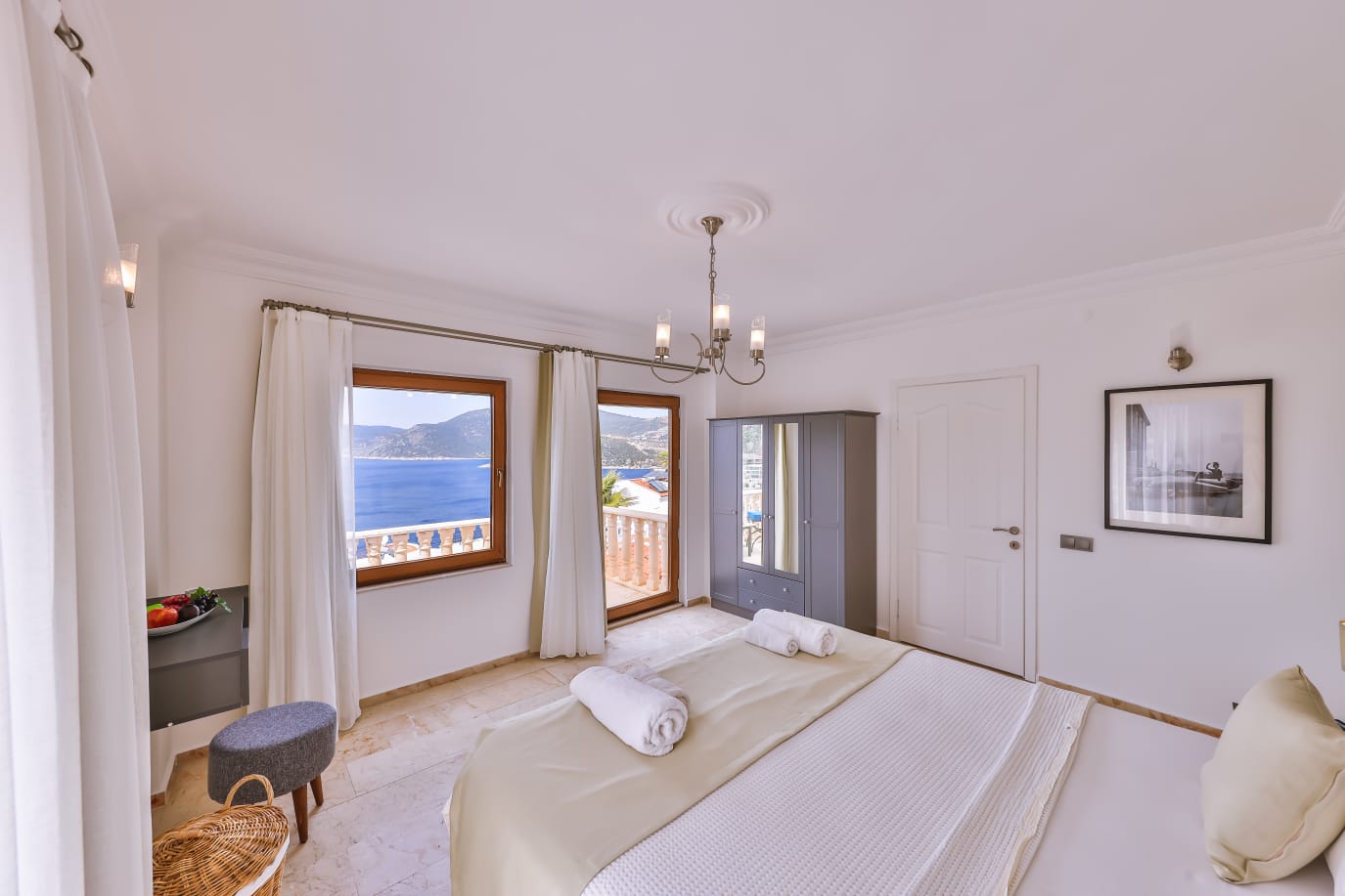 Double bedroom and bathroom with balcony access in Villa Palmiye, villa holidays in Kalkan, Turkey