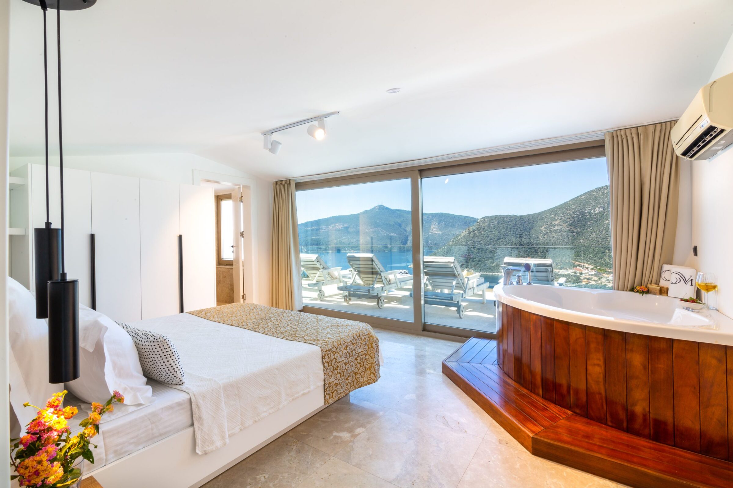 Double bedroom with bath at Villa Moonshine, villa holiday in Kalkan, Turkey