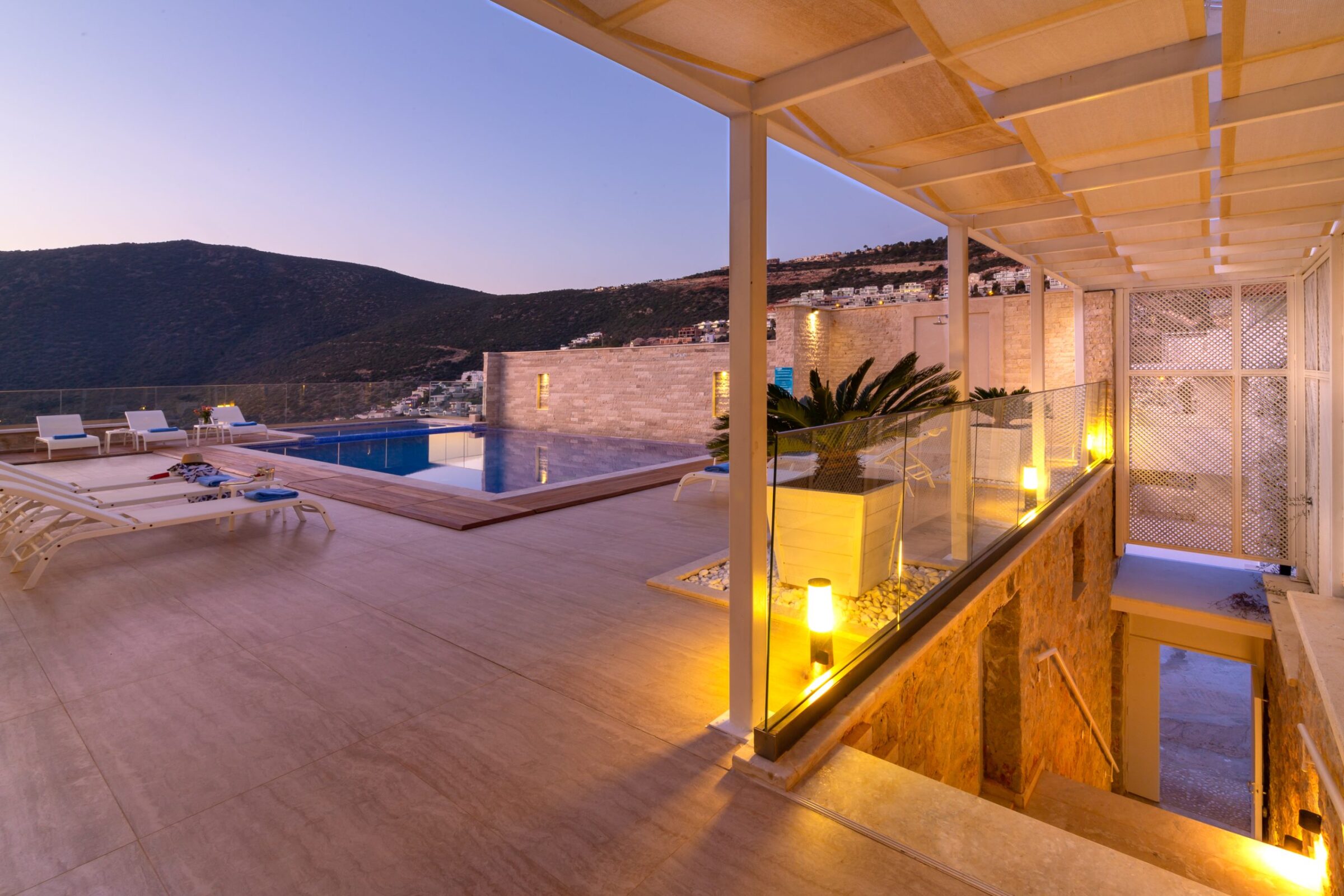 Outdoor pool and sun loungers at Villa Moonshine, villa holiday in Kalkan, Turkey