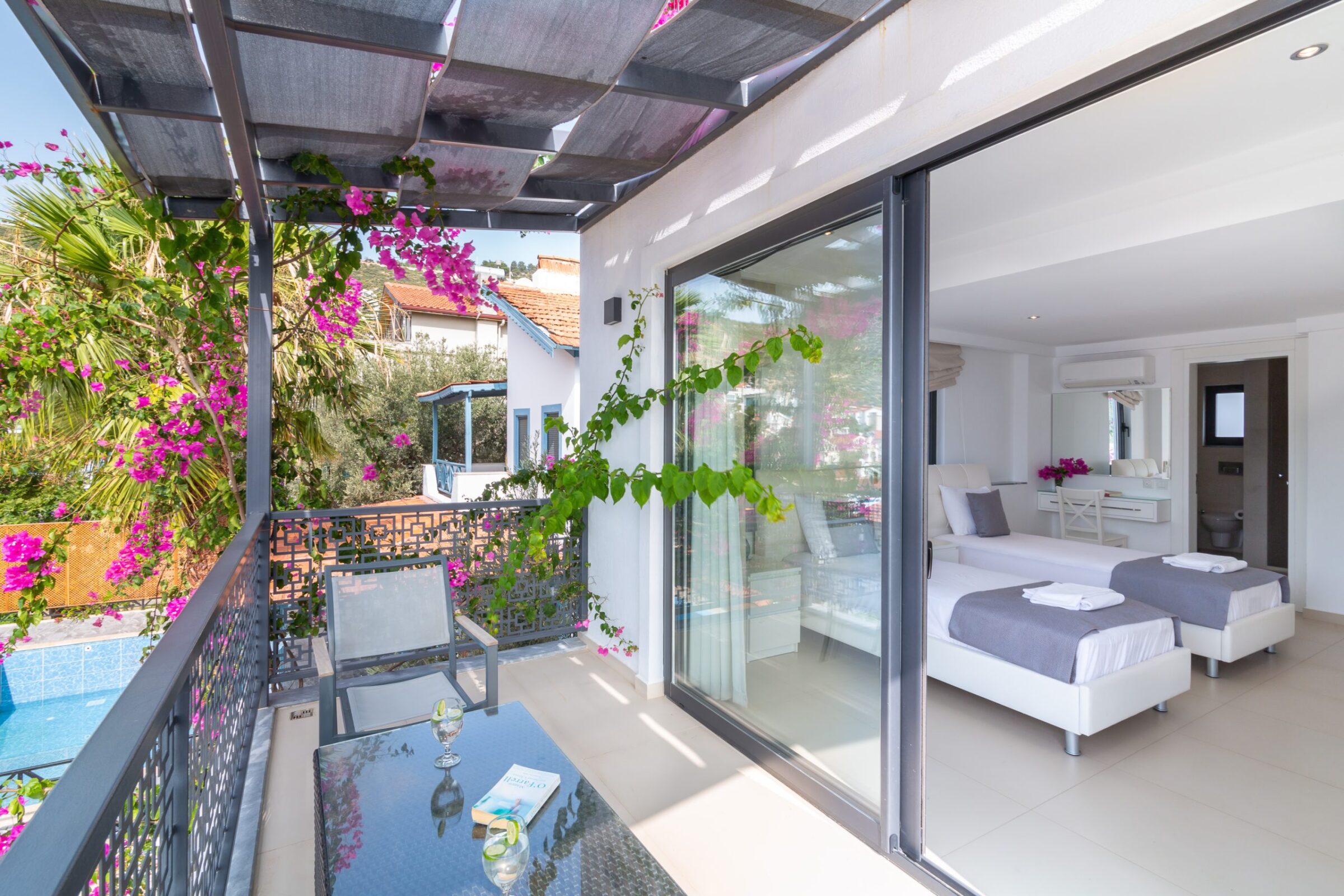 Twin room and balcony of luxurious Villa Nar Evi in Kalkan, Turkey