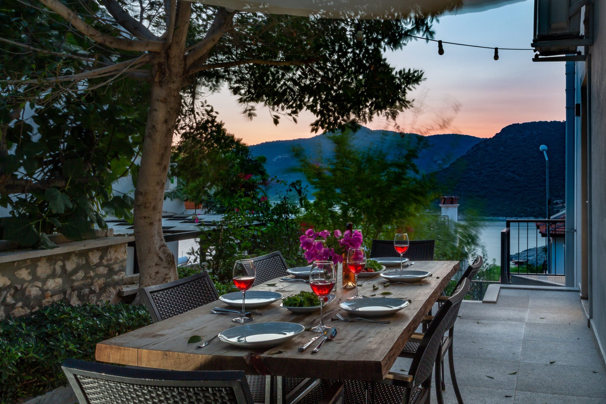 Outdoor dining area of luxurious Villa Nar Evi in Kalkan, Turkey