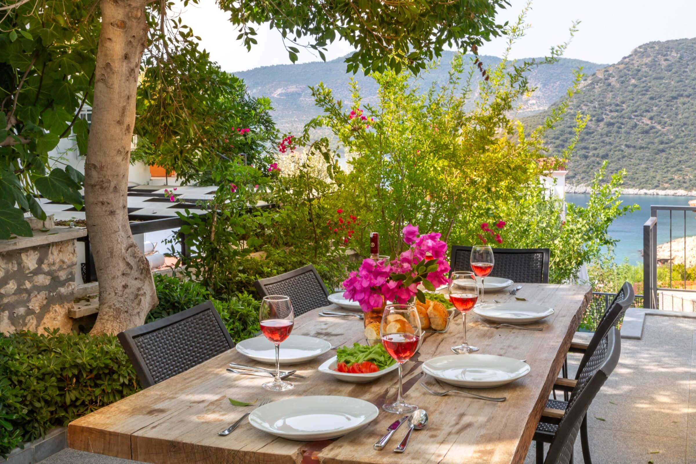 Outdoor dining area of luxurious Villa Nar Evi in Kalkan, Turkey