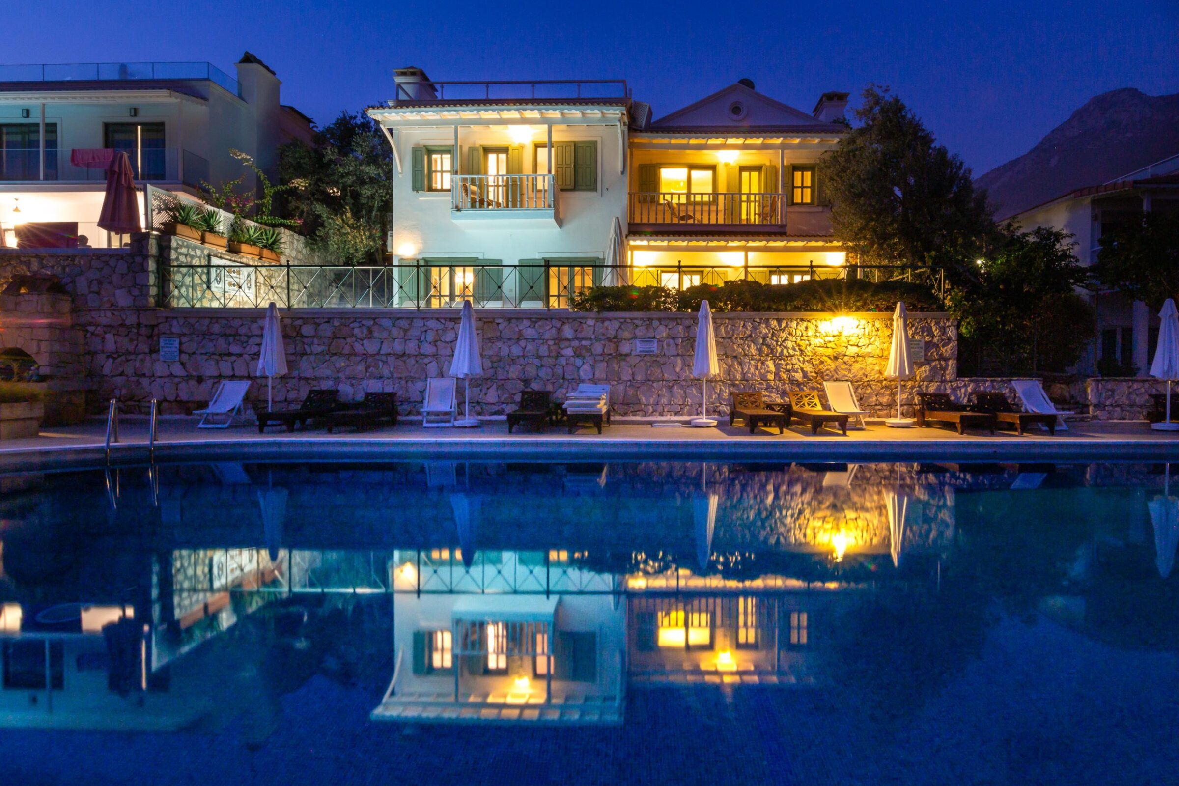 Luxury villa holiday in Turkey at villa Yesil Ev—pool area in the evening