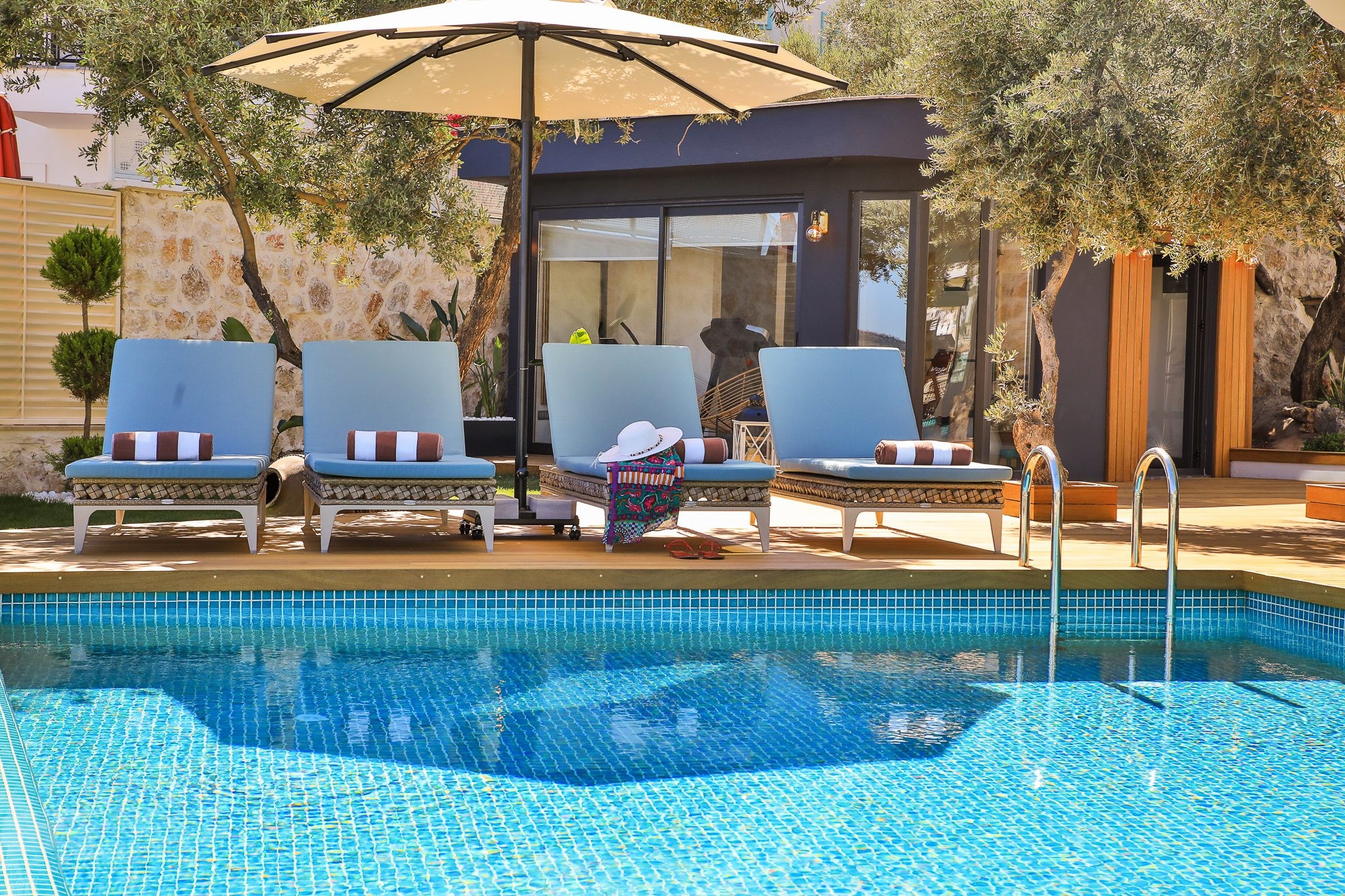 Outdoor pool and sun loungers in Villa Sandie, villas to rent in Kalkan, Turkey