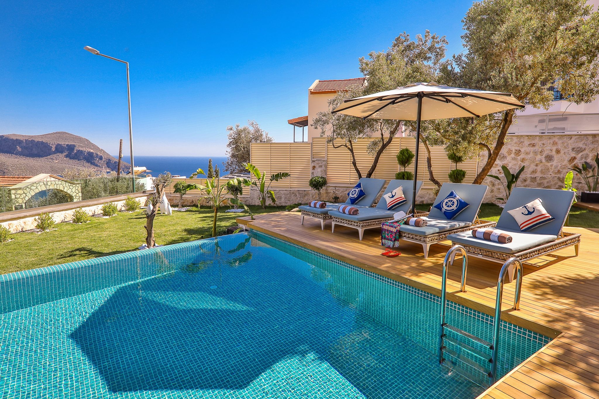 Outdoor pool and sun loungers in Villa Sandie, villas to rent in Kalkan, Turkey