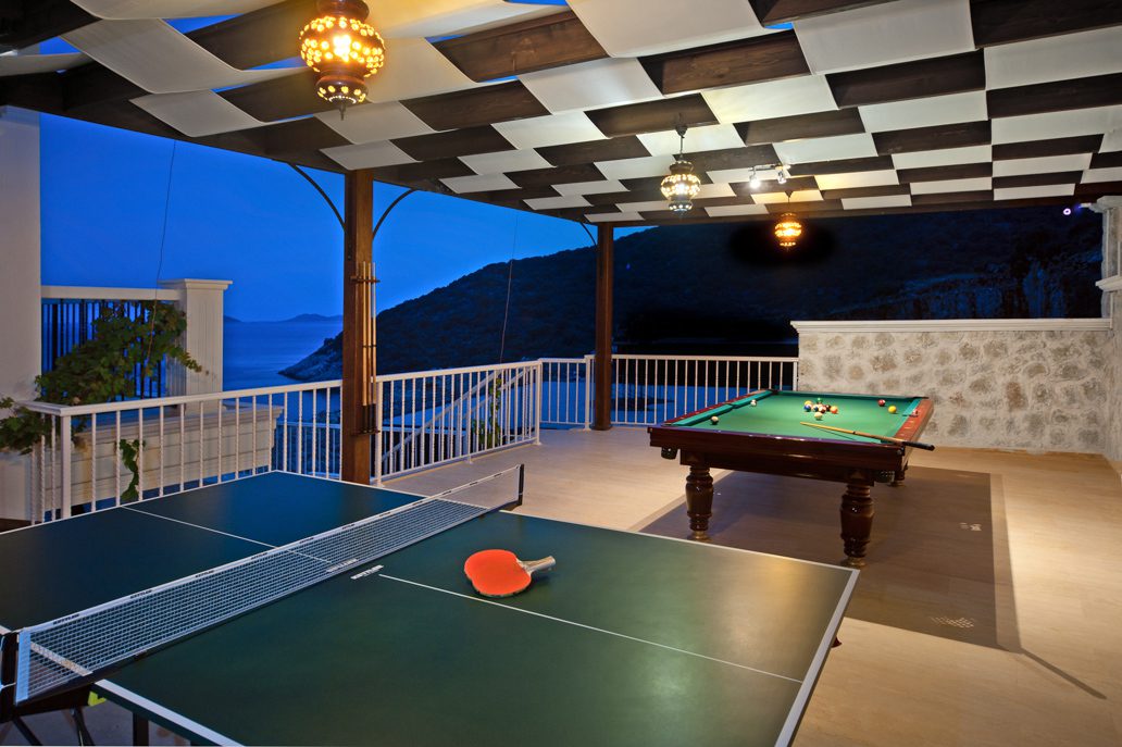 Outdoor pool table and tennis table in Korsan Kuzey Guney, villa to rent in Turkey