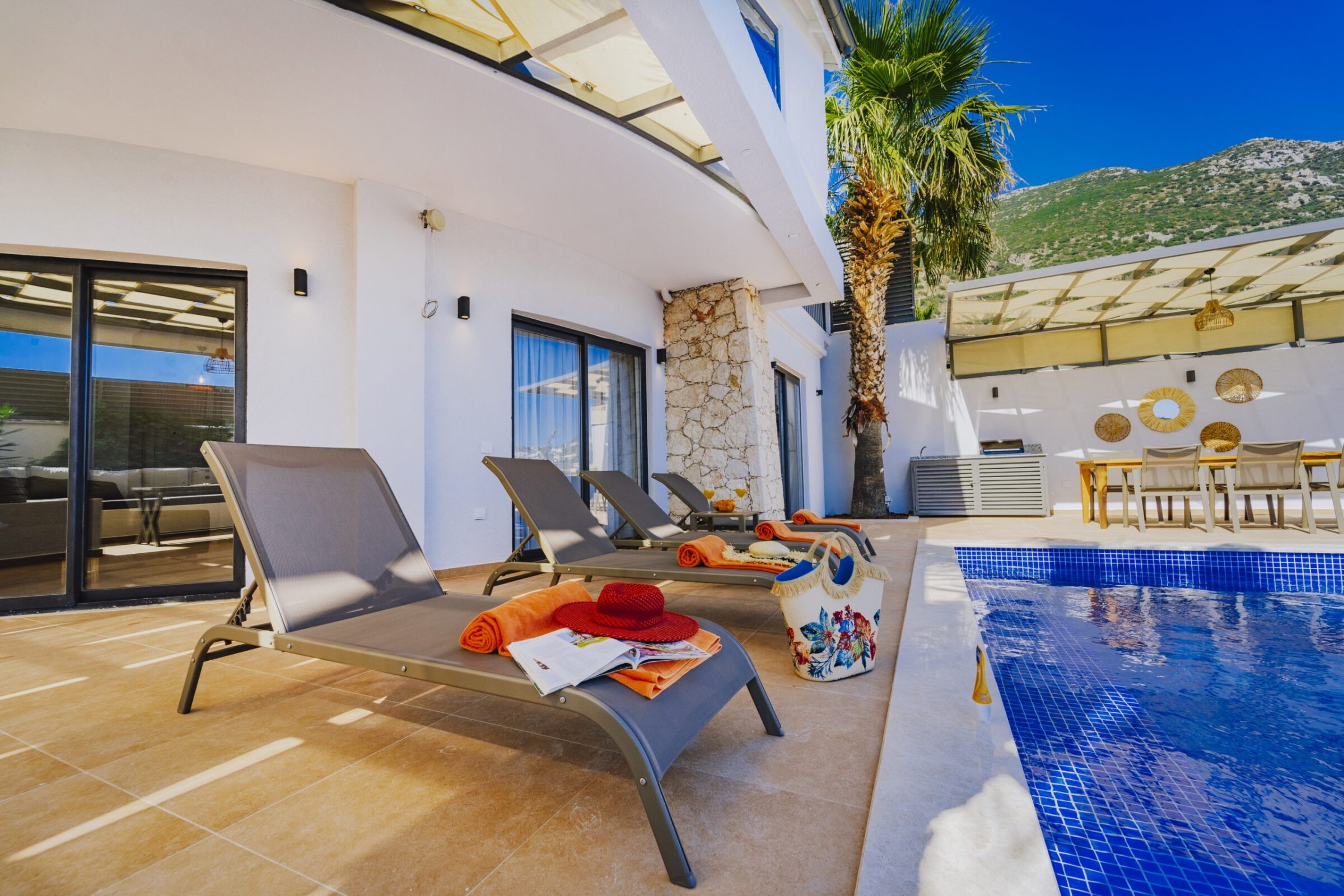 Outdoor pool and sun loungers in Villa Coast, villa to rent in Kalkan, Turkey