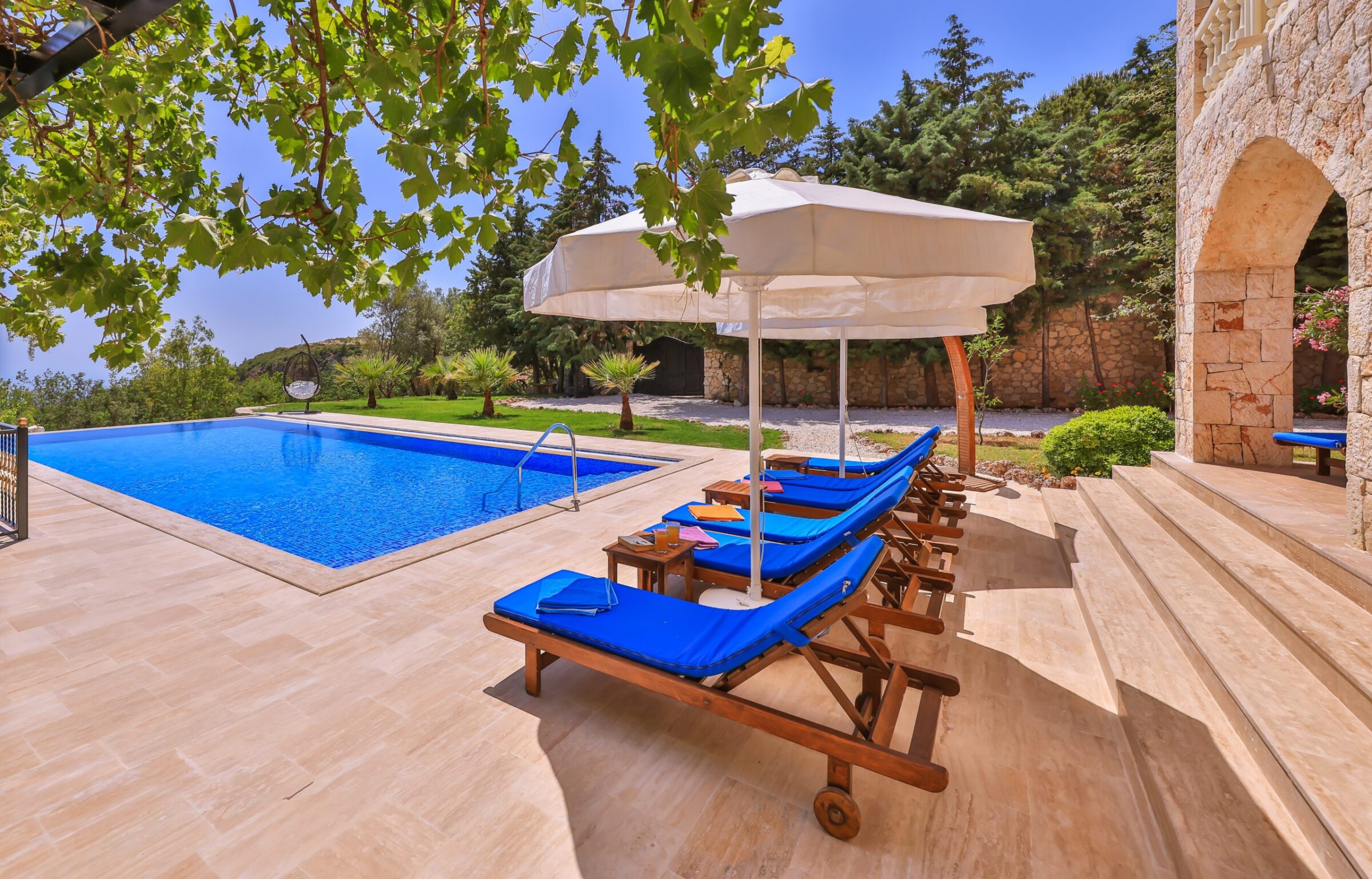 Outdoor pool and sun loungers in Villa Tranquility, villa to rent in Kalkan, Turkey