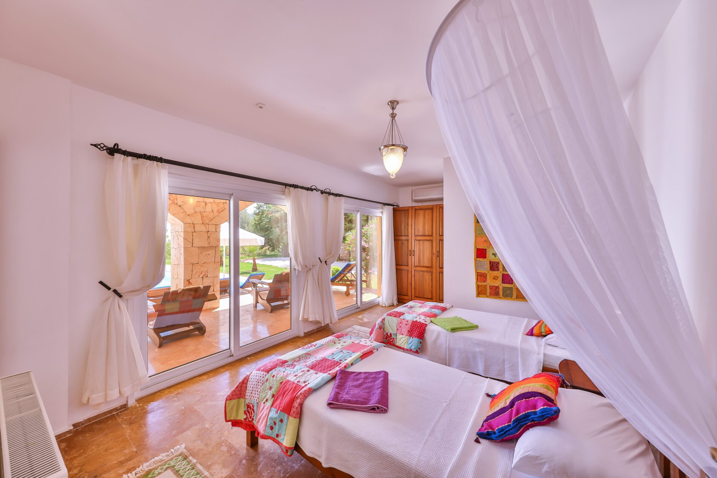 Twin bedroom with garden access in Villa Tranquility, villa to rent in Kalkan, Turkey
