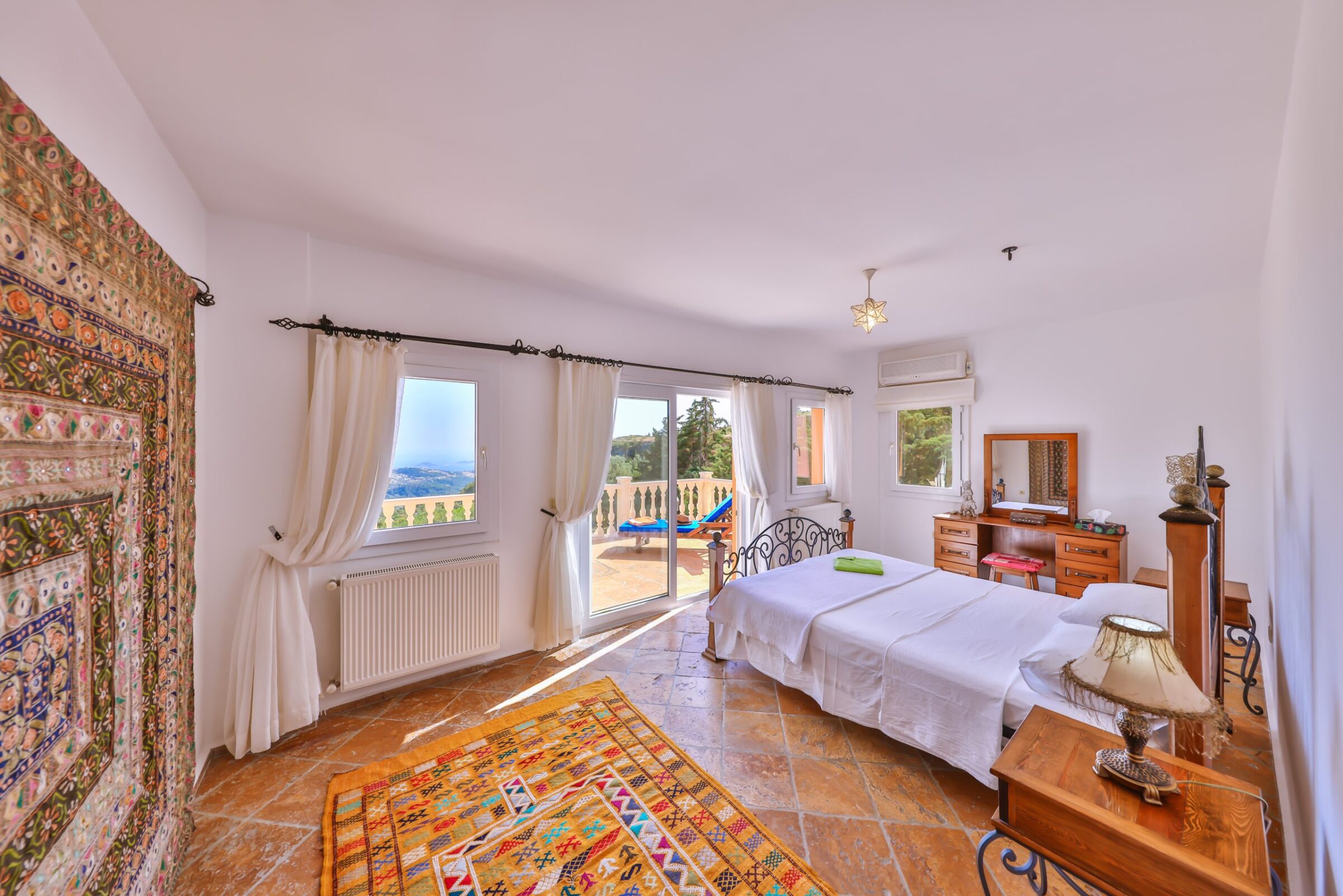 Spacious double bedroom with balcony in Villa Tranquility, villa to rent in Kalkan, Turkey
