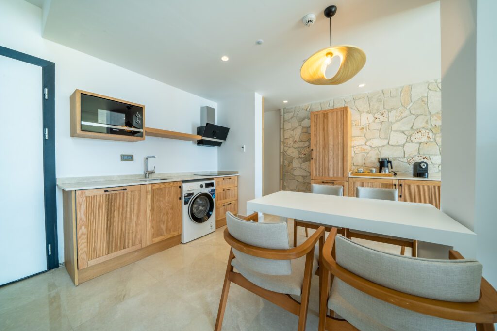 Kitchen and dining area in Lures Hotel Villa Room, holidays in Kalkan, Turkey