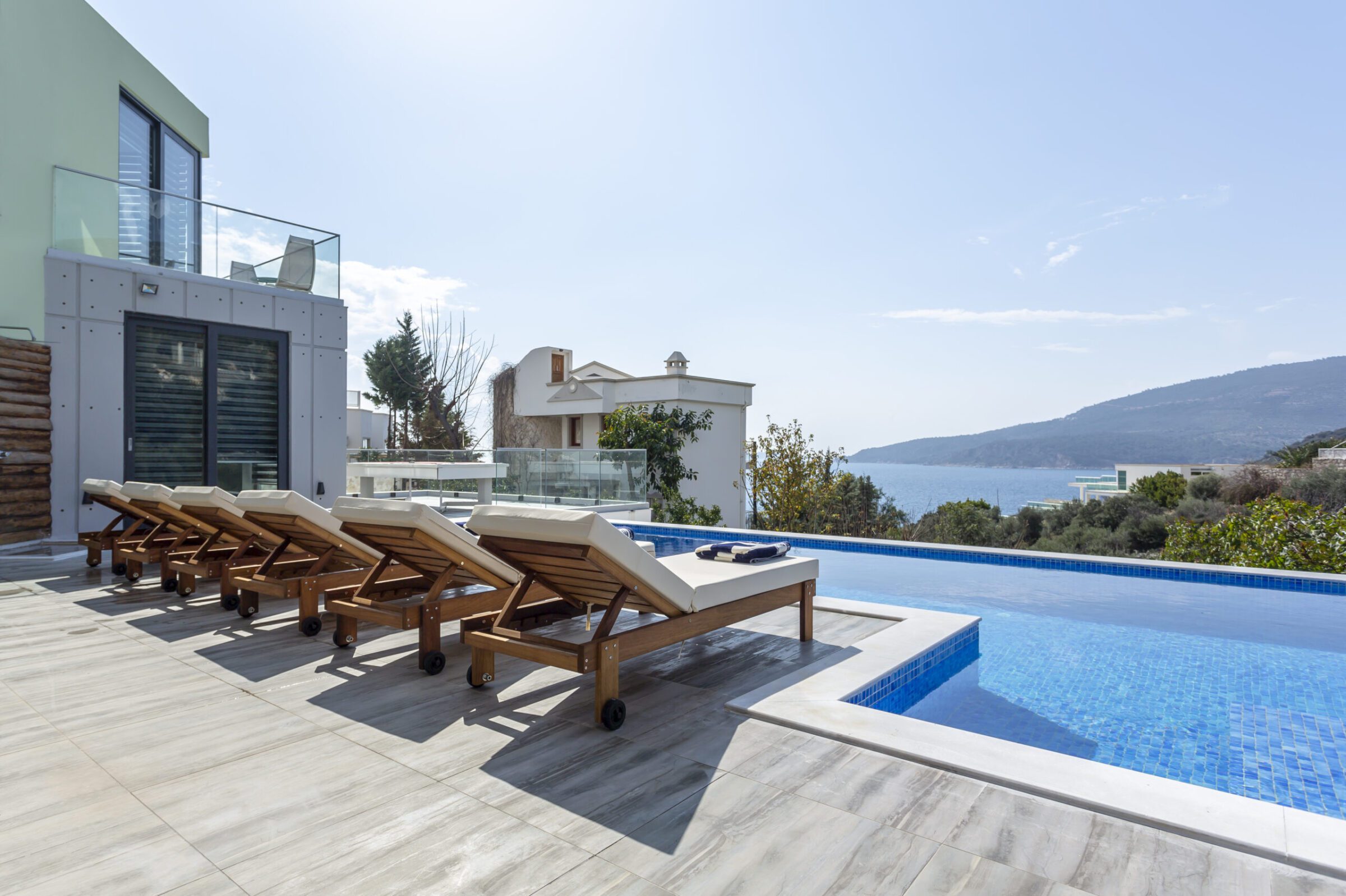 Outdoor pool and sun loungers in Villa Poyraz, villa holidays in Kalkan, Turkey