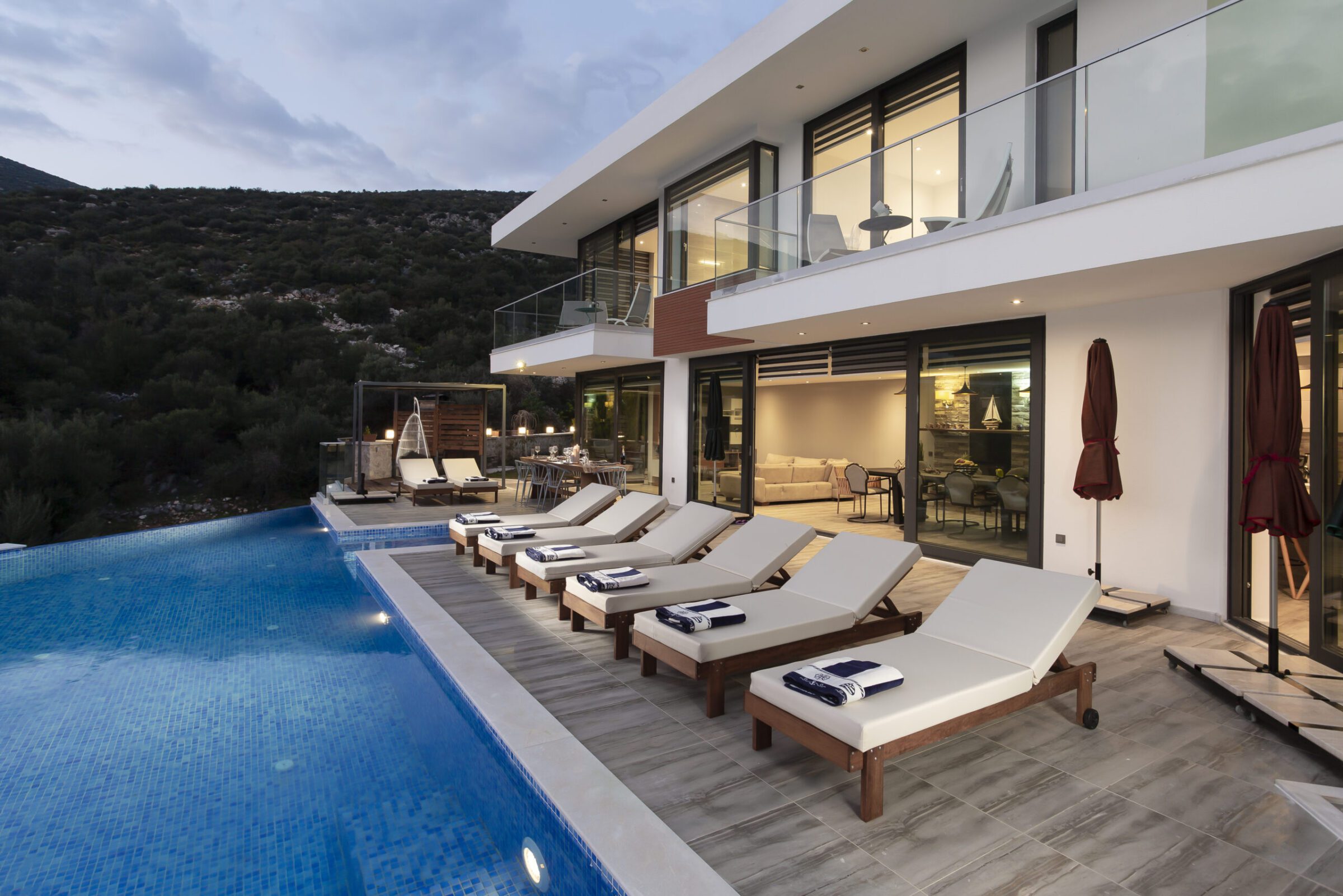 Outdoor pool with sun loungers in Villa Poyraz, villa holidays in Kalkan, Turkey