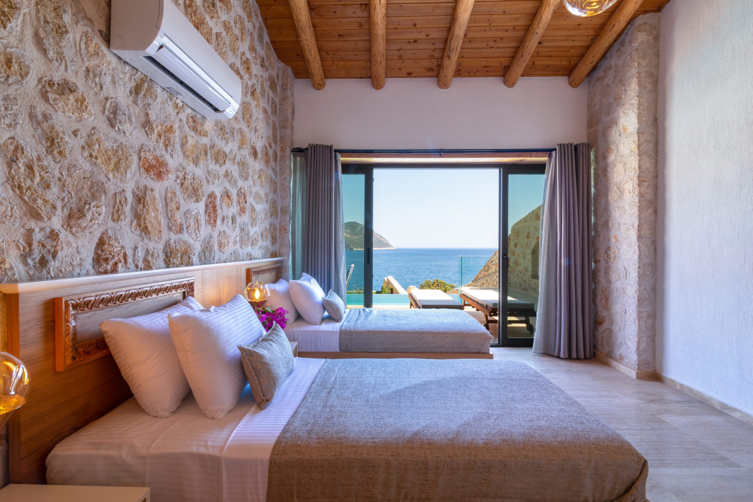 Twin bedroom with garden access in Villa Water Edge 3, villa holidays in Kalkan, Turkey