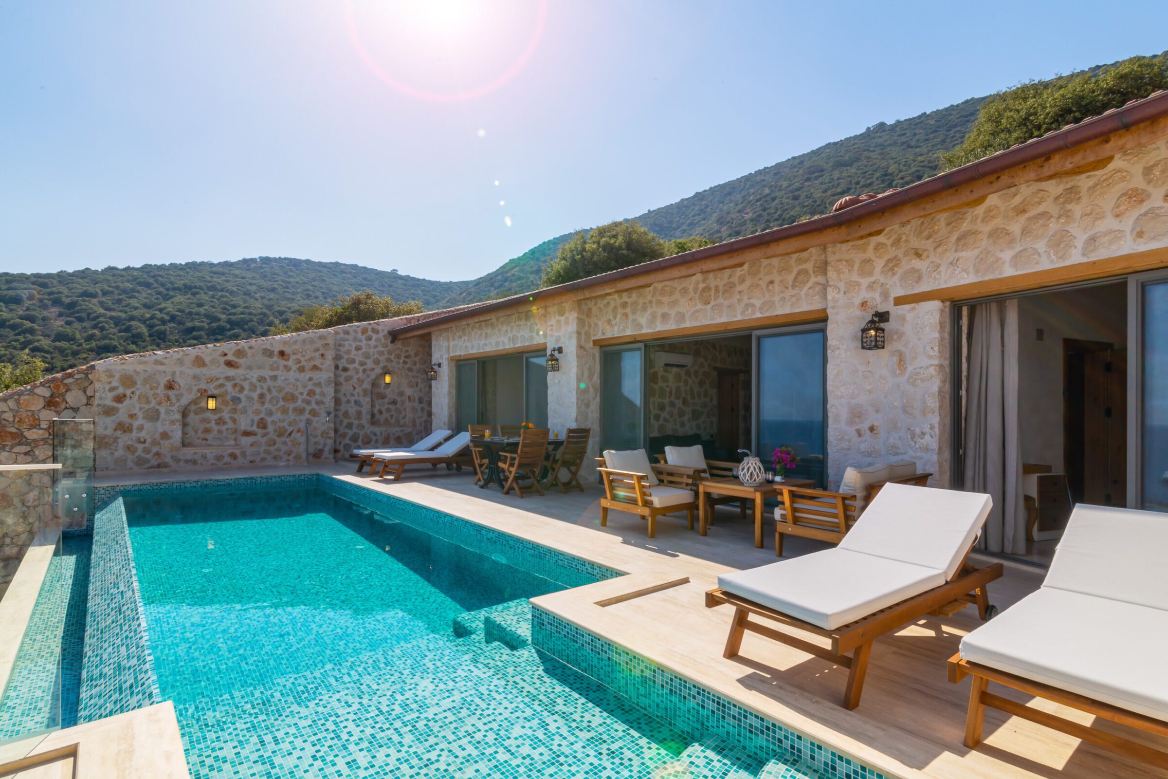 Outdoor pool and sun loungers in Villa Water's Edge 3, villa holidays in Kalkan, Turkey