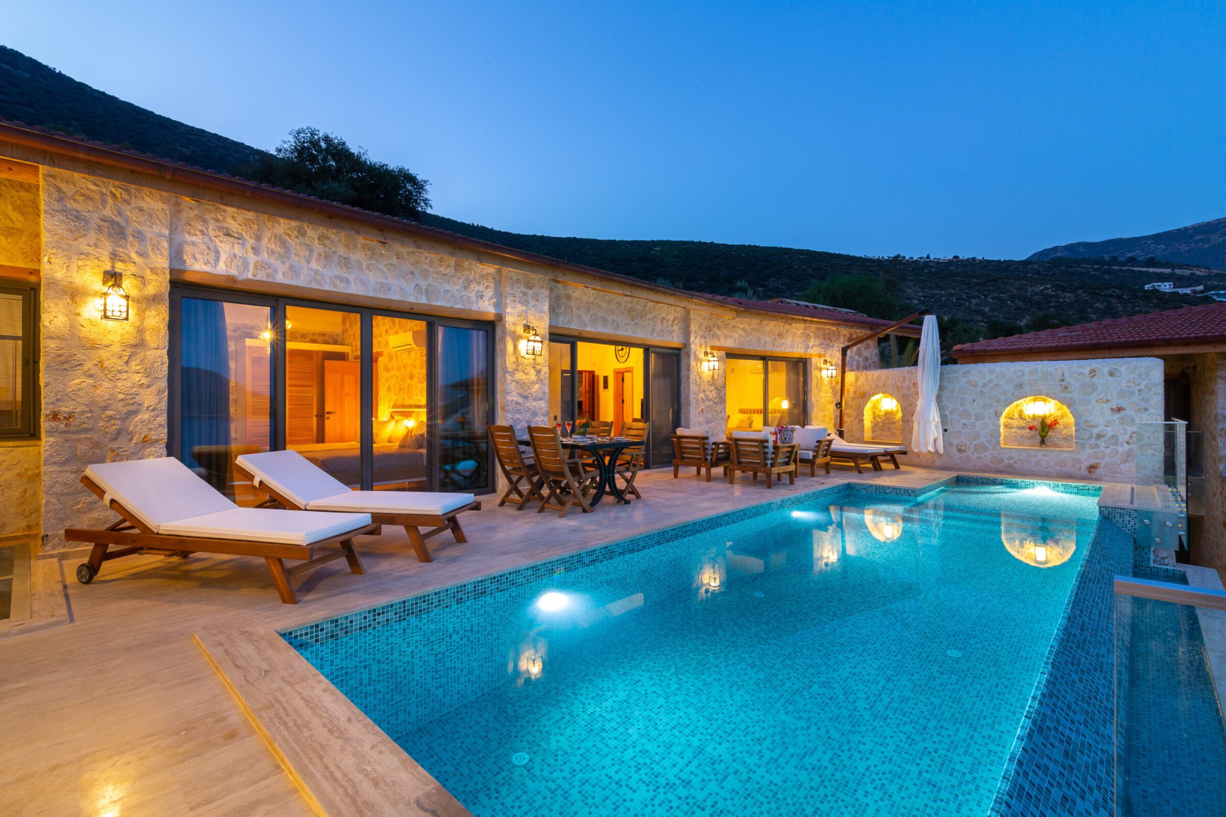 Outdoor pool with sun loungers at Villa Water Edge 3, villa holidays in Kalkan, Turkey