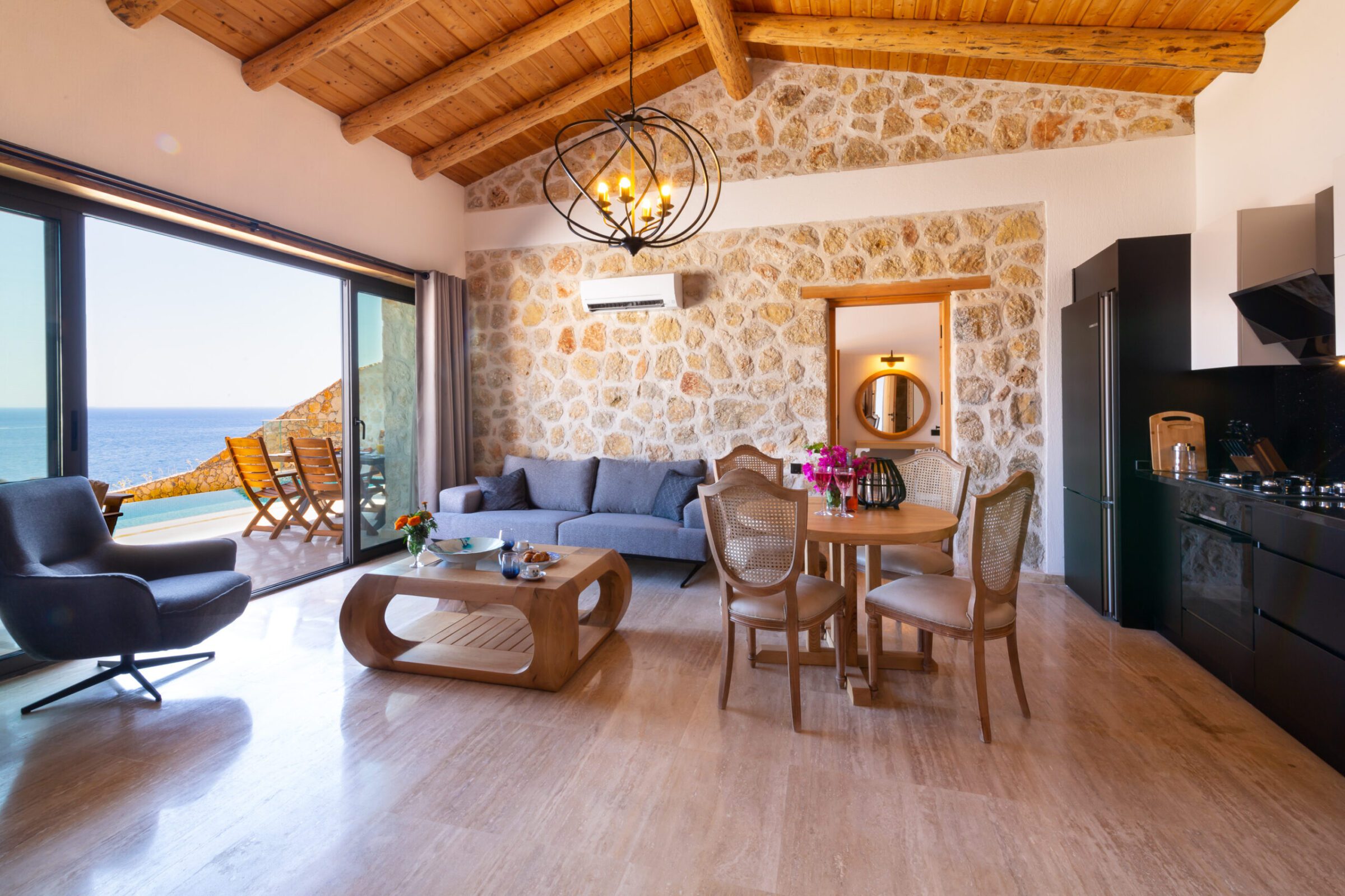 Open-planned kitchen and lounge in Villa Water Edge 3, villa holidays in Kalkan, Turkey