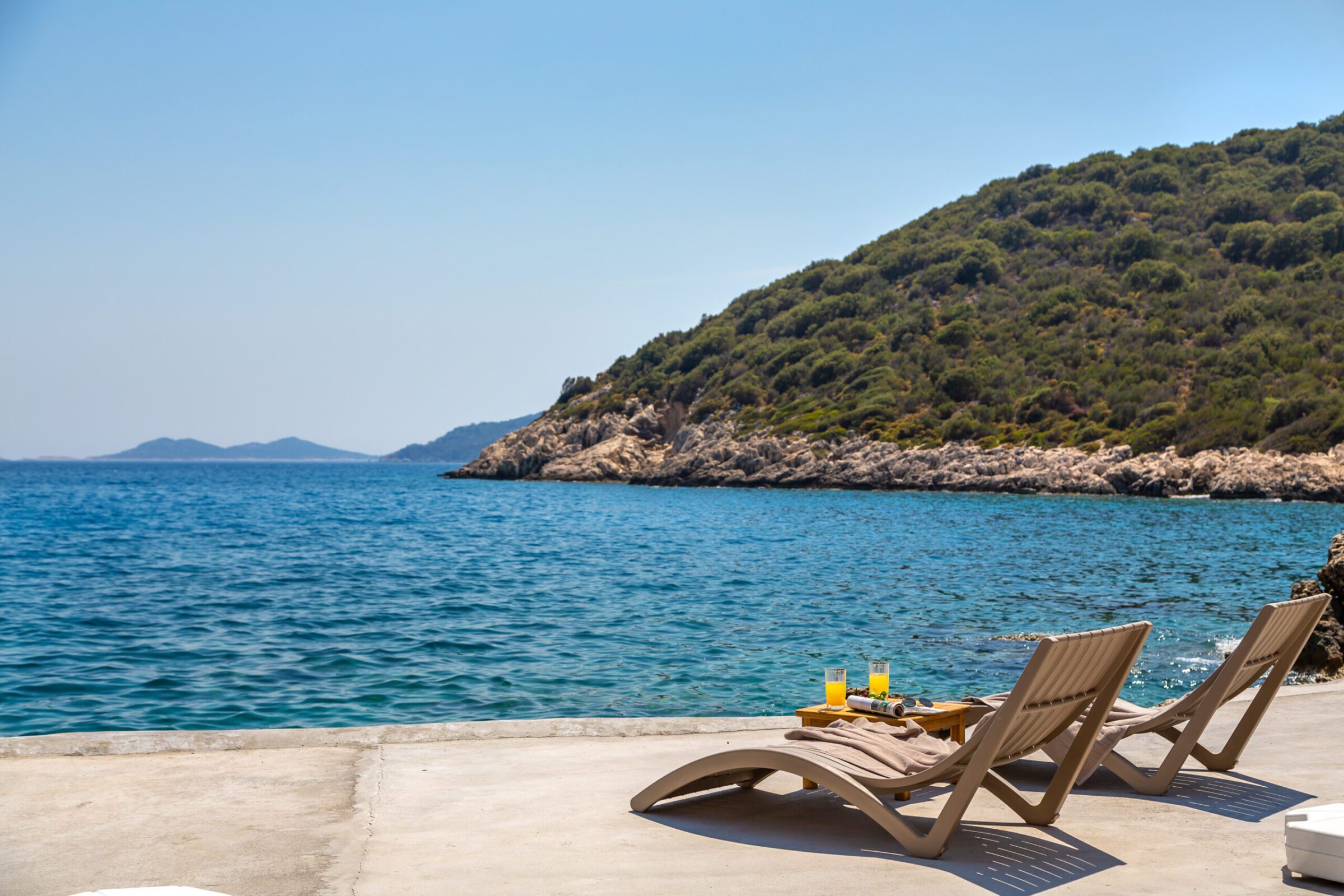 Private beach with sun loungers for Villa Water Edge 1, villas to rent in Kalkan, Turkey