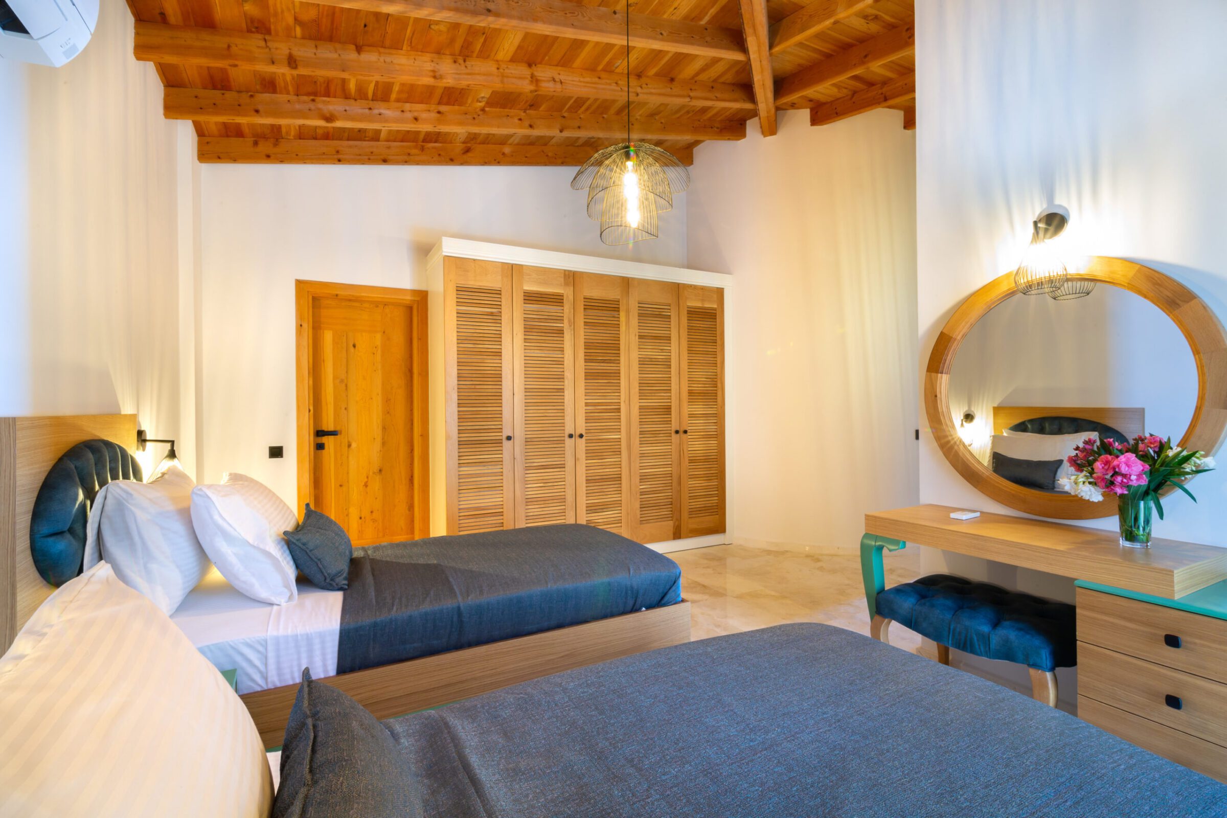 Twin bedroom and bathroom in Villa Water Edge 2, villas to rent in Kalkan, Turkey