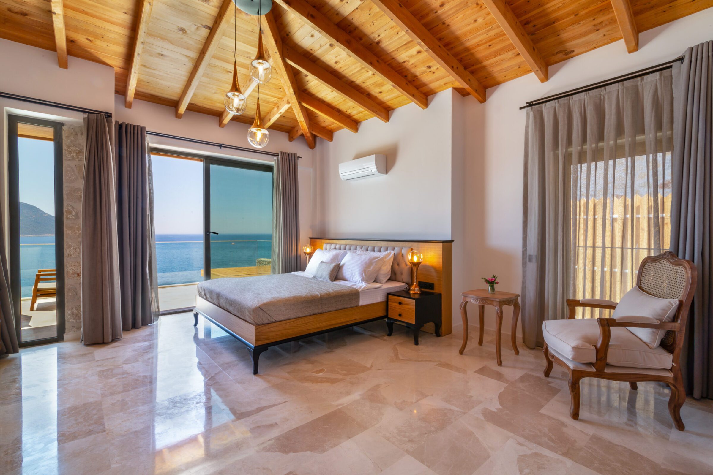 Double bedroom with bathroom and balcony in Villa Water Edge 2, villas to rent in Kalkan, Turkey