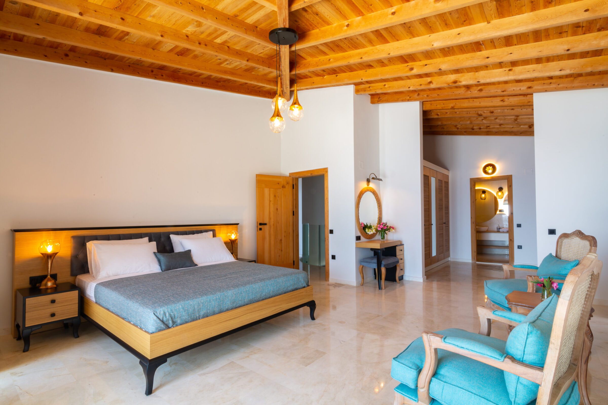Double bedroom with bathroom and balcony in Villa Water Edge 2, villas to rent in Kalkan, Turkey