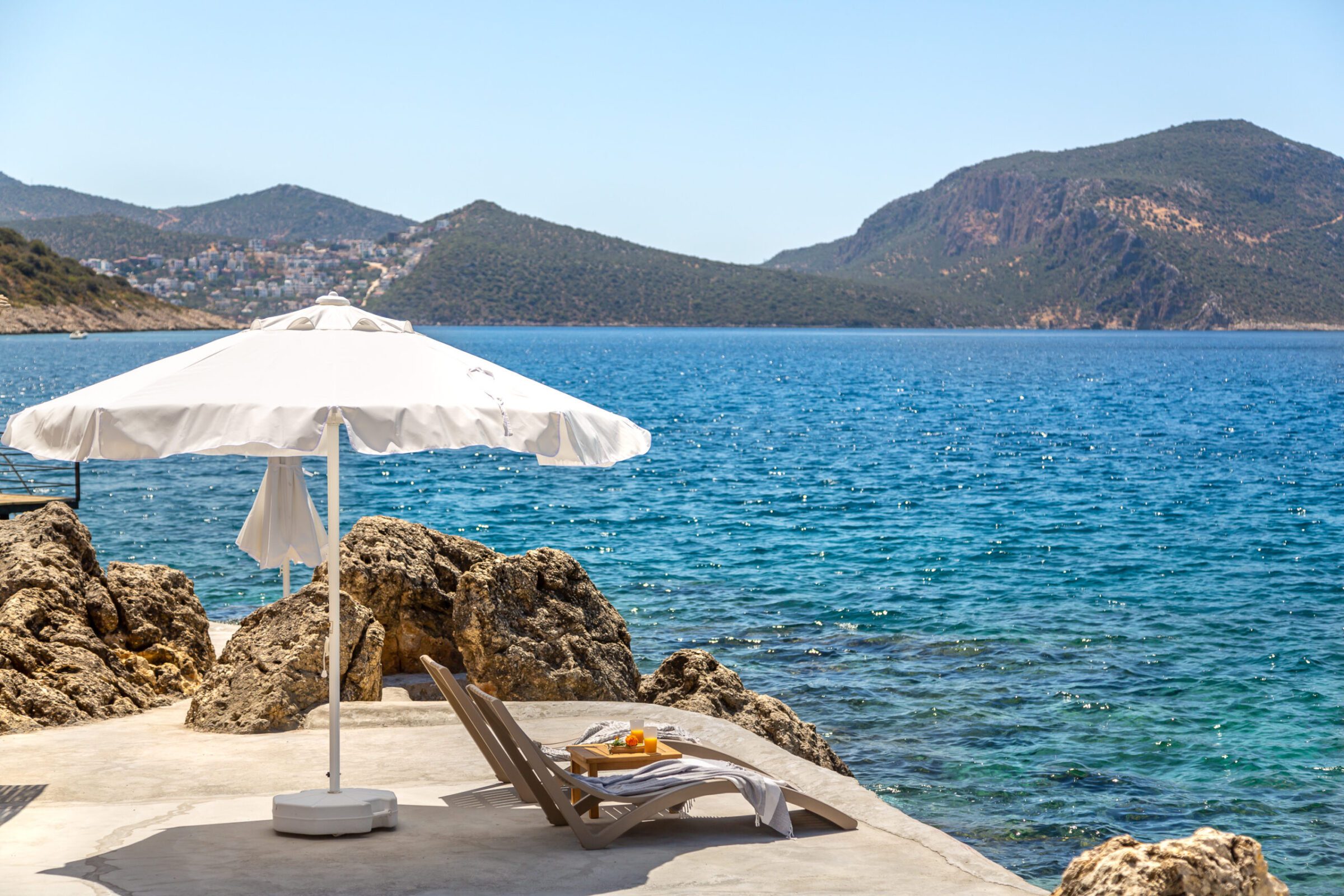 Sun loungers at beach for Villa Water Edge 6, villas to rent in Kalkan, Turkey