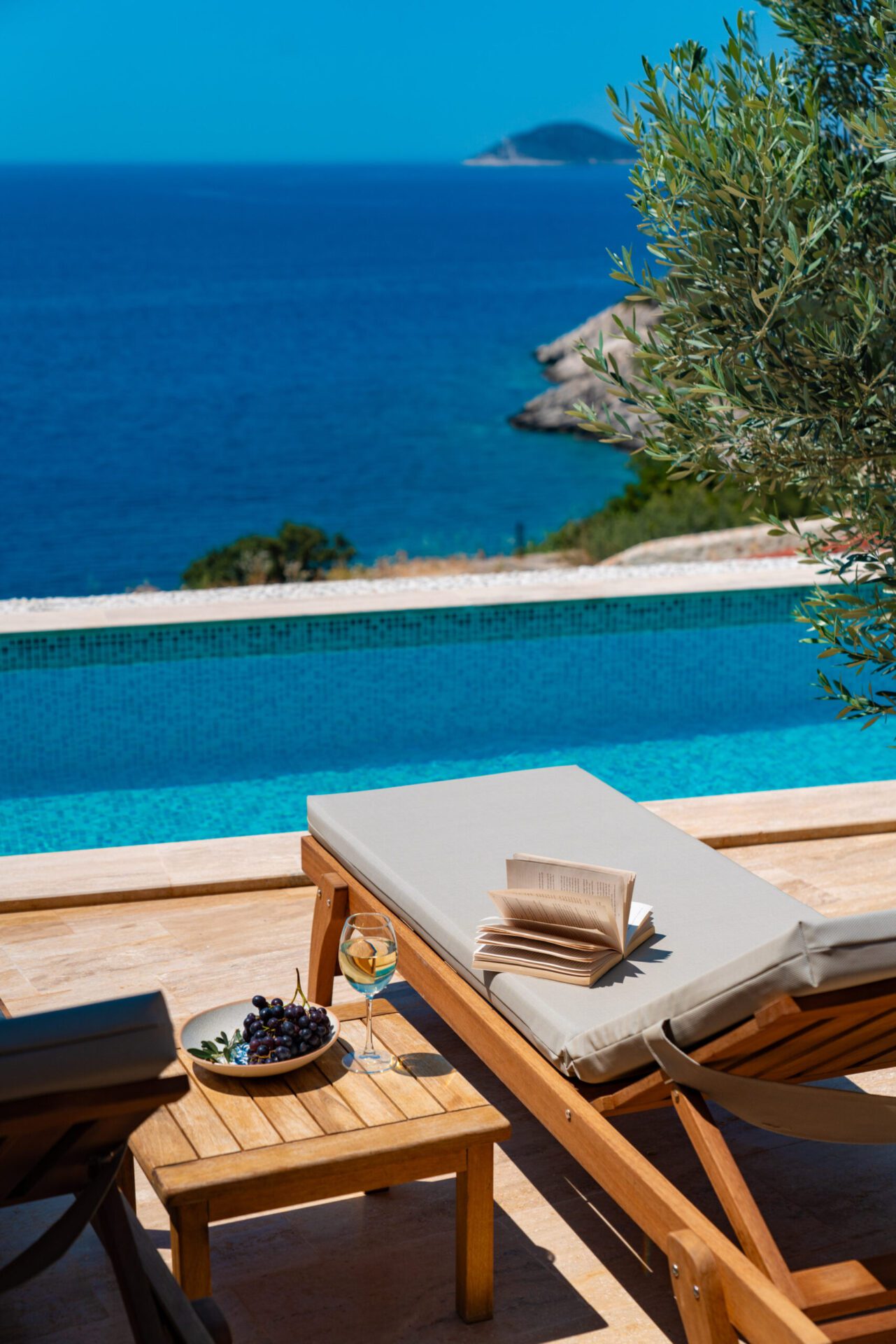 Outdoor pool and sun loungers at Villa Water Edge 4, villas to rent in Kalkan, Turkey