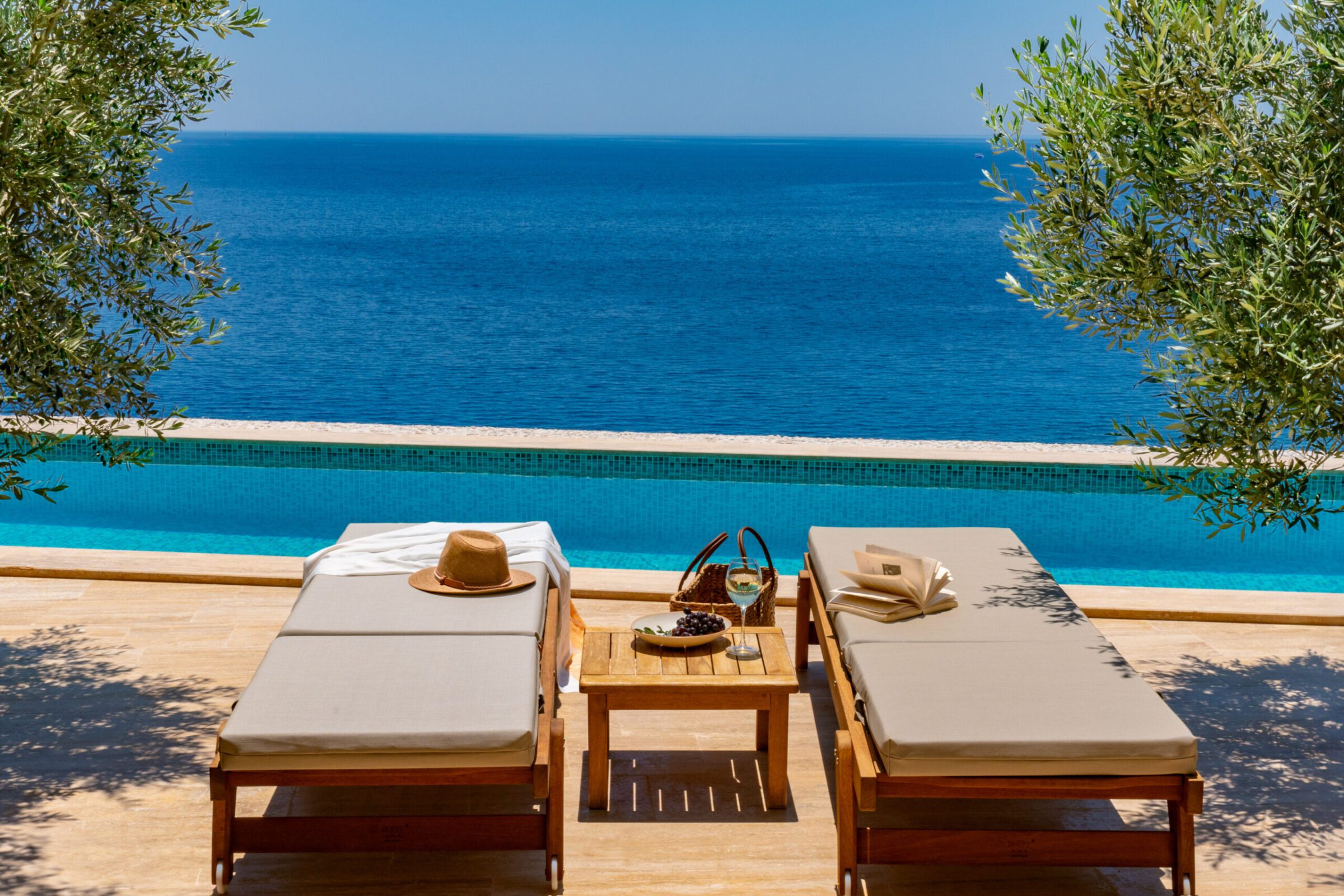 Sun loungers and pool in Villa Water Edge 4, villas to rent in Kalkan, Turkey