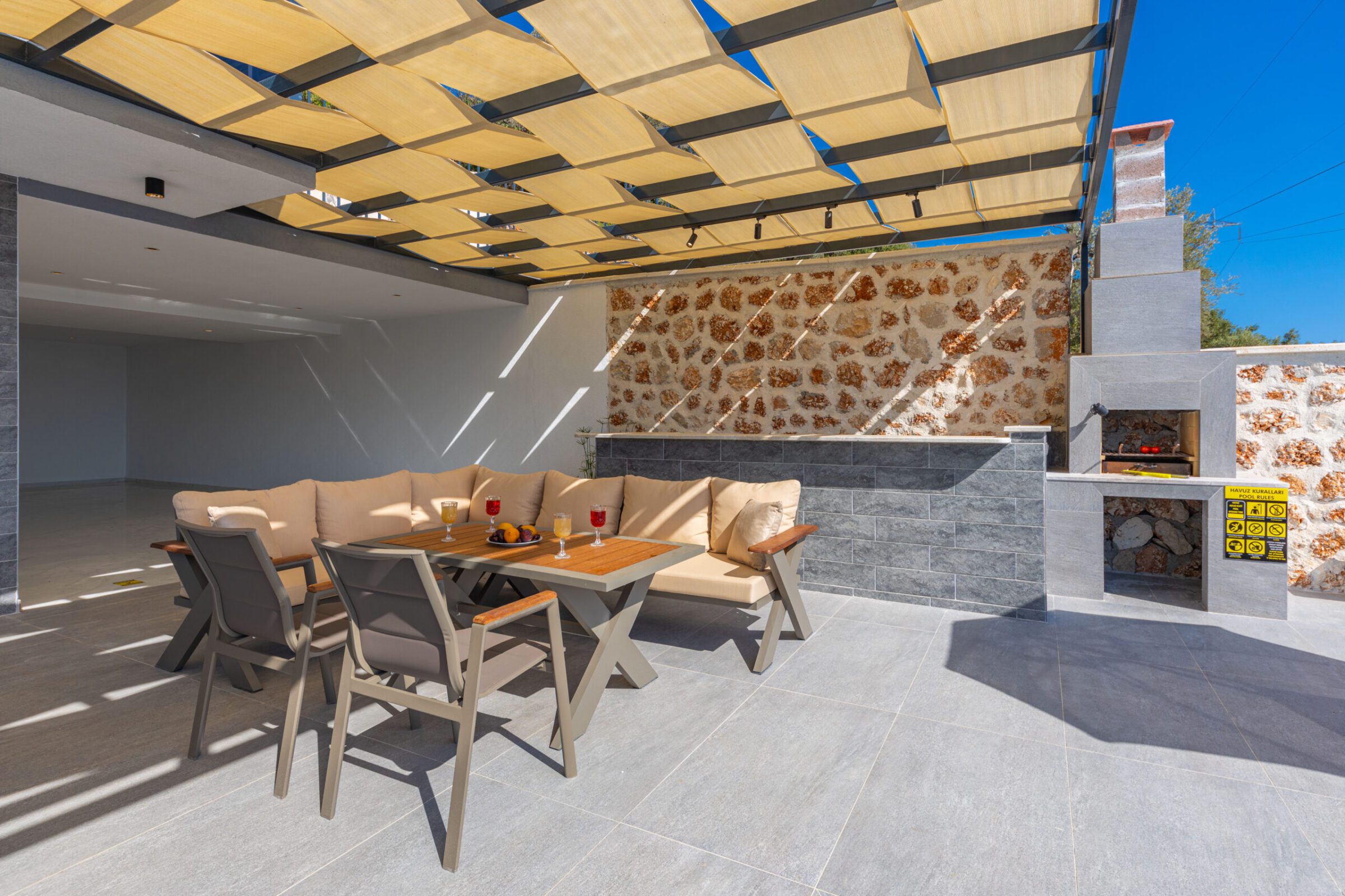 Outdoor kitchen and seating area in Villa Royal Falcon, villas to rent in Kalkan, Turkey