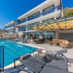 Outdoor infinity pool and sun loungers in Villa Royal Falcon, villas to rent in Kalkan, Turkey