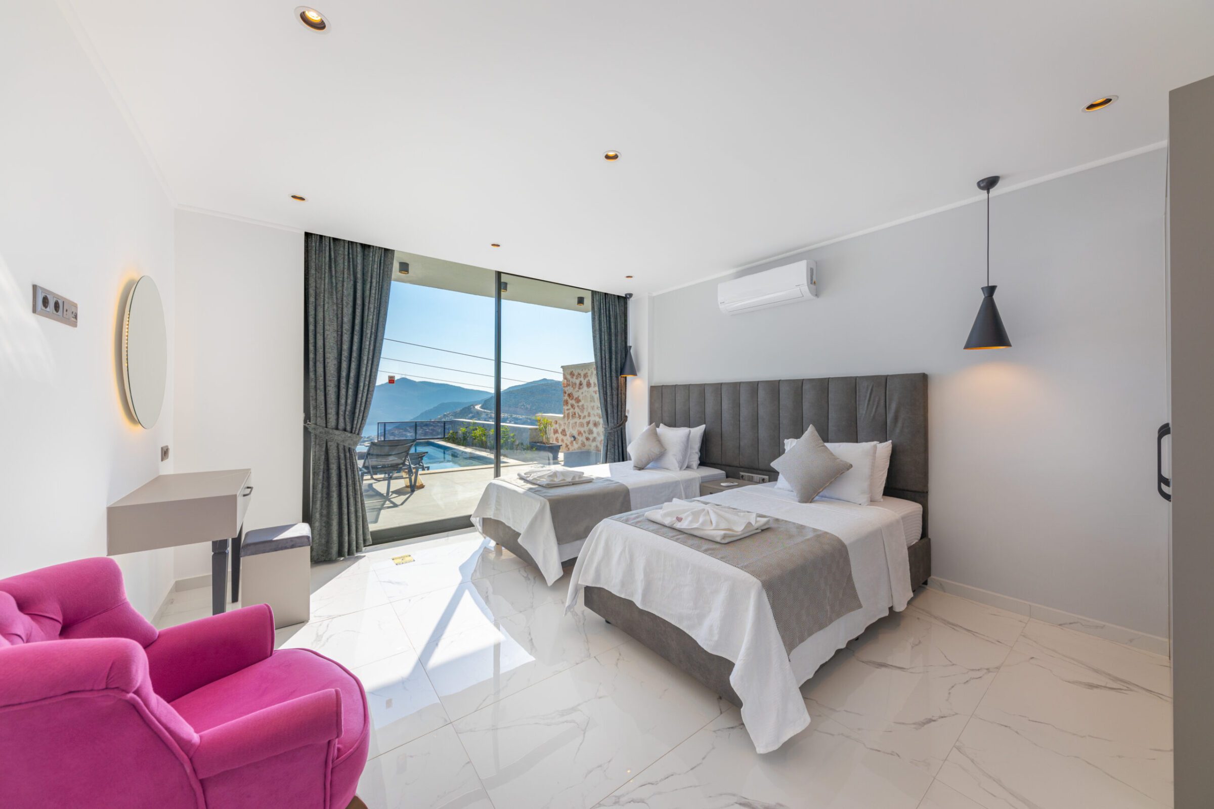 Twin bedroom with bathroom and garden access in Villa Royal Falcon, villas to rent in Kalkan, Turkey