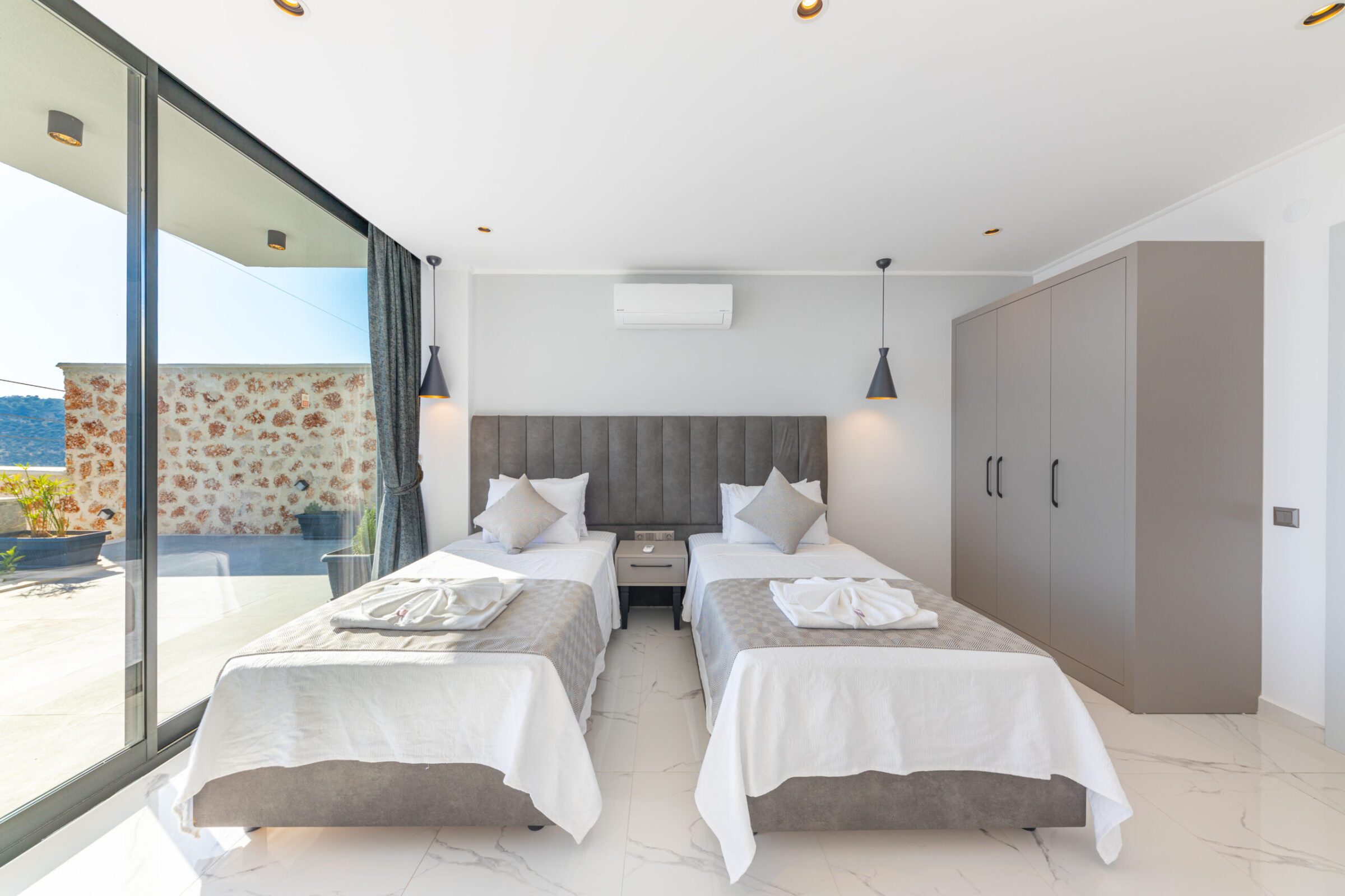 Twin bedroom with garden access in Villa Royal Falcon, villas to rent in Kalkan, Turkey