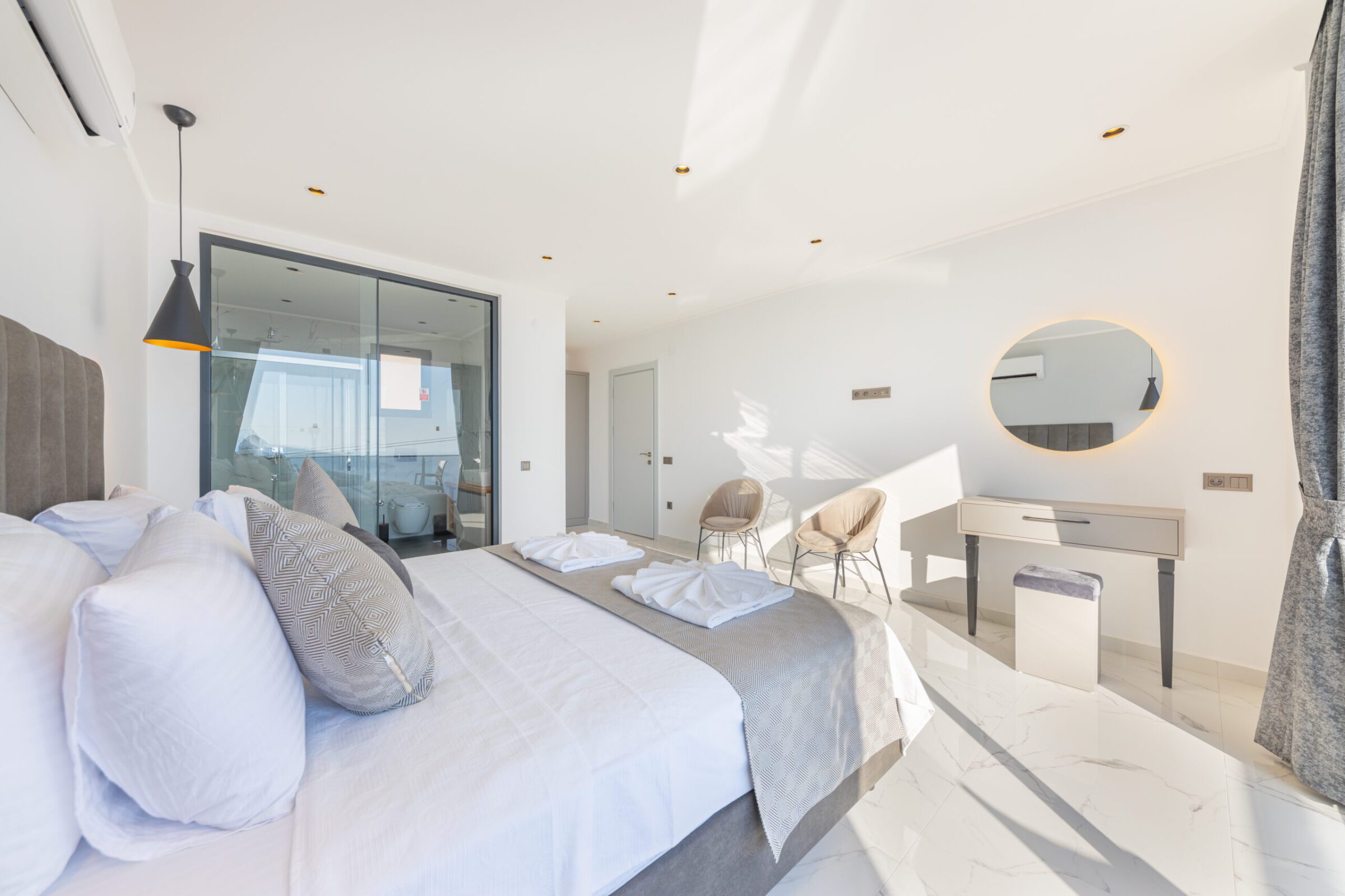 Double bedroom with bathroom and balcony in Villa Royal Falcon, villas to rent in Kalkan, Turkey