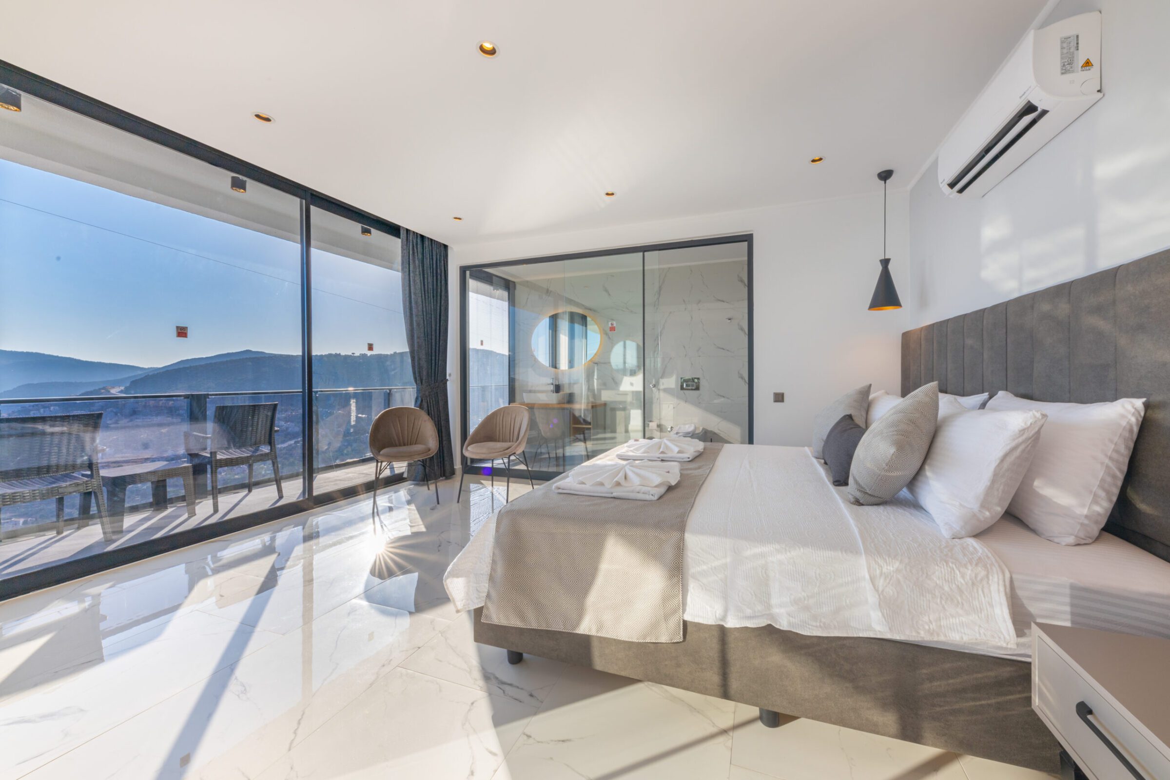 Double bedroom with bathroom and balcony in Villa Royal Falcon, villas to rent in Kalkan, Turkey