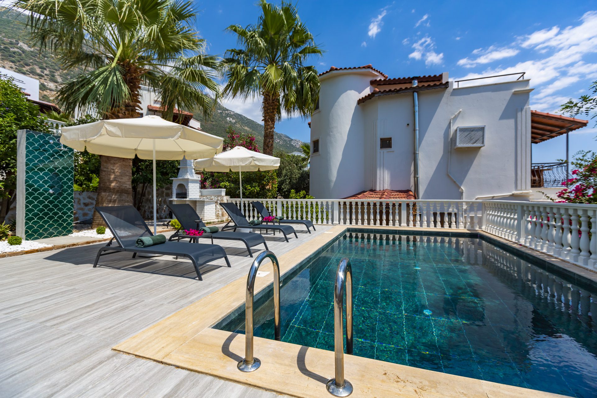 Outdoor pool with sun loungers in Villa Verde, holiday villa to rent in Kalkan, Turkey
