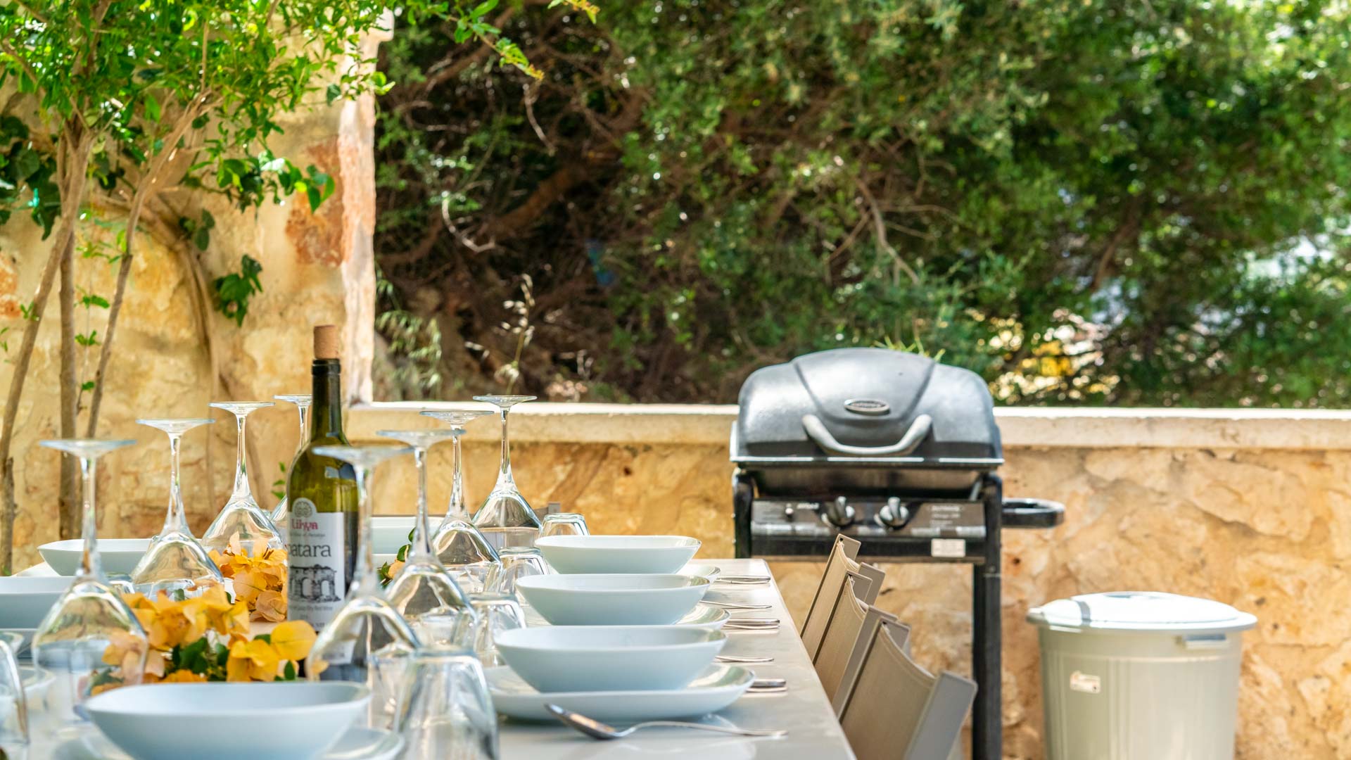 BBQ and outdoor dining table in Villa Elia, villa holidays in Kalkan, Turkey