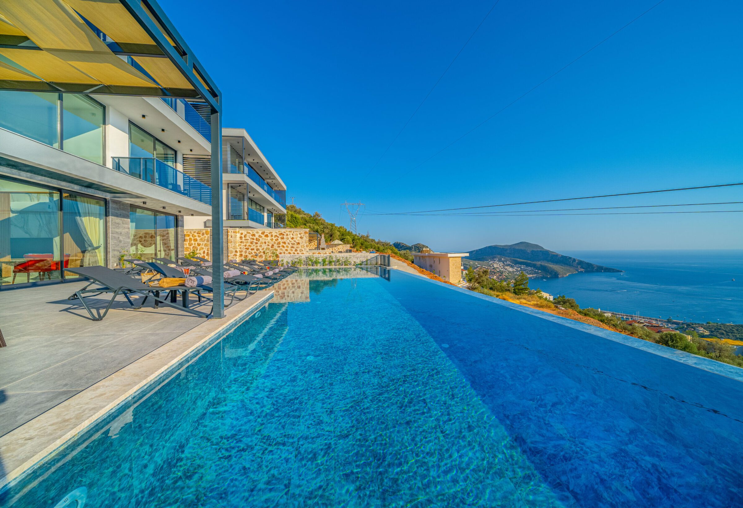 Infinity pool and sun loungers in Villa Grey Falcon, villas to rent in kalkan, Turkey