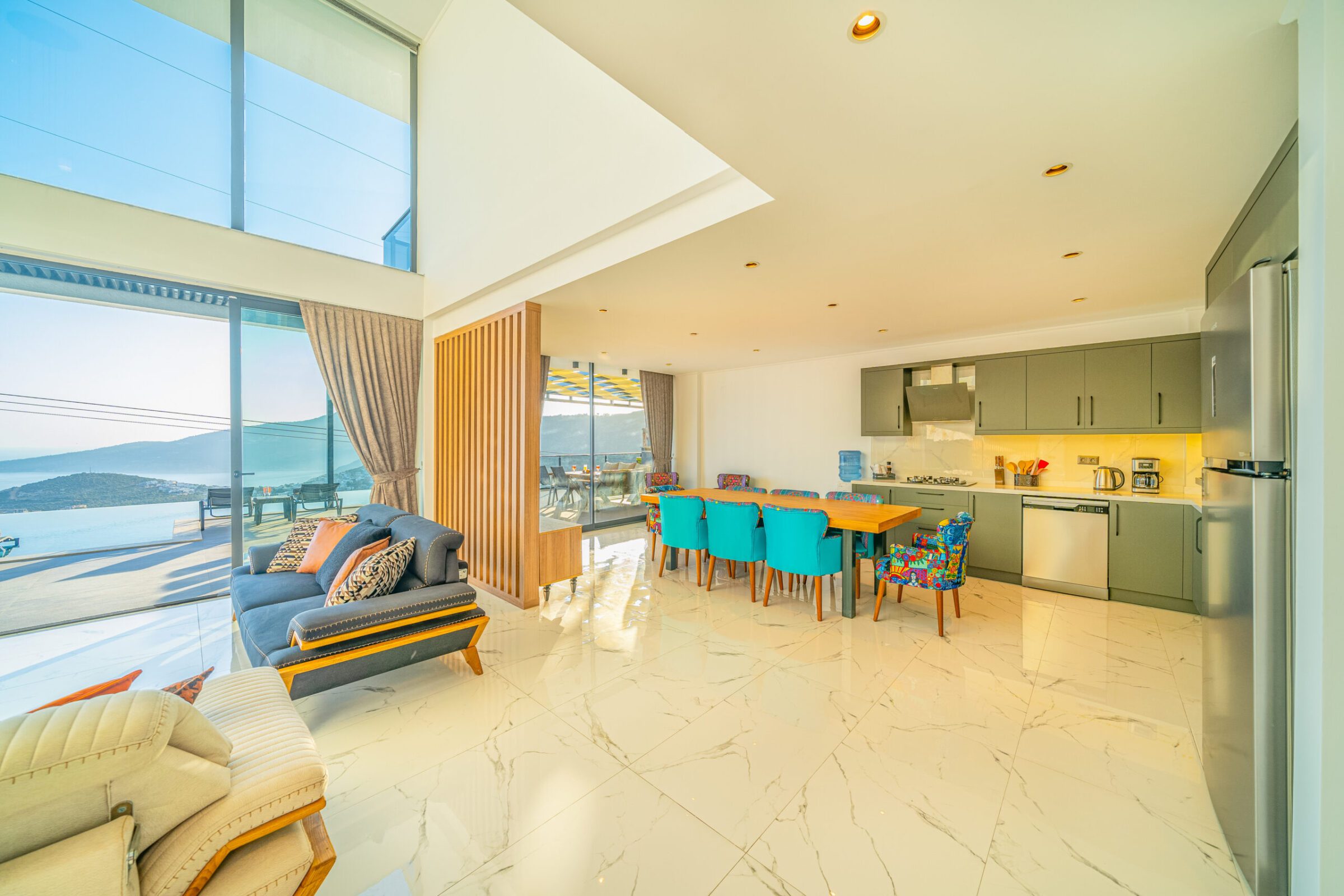Open-planned kitchen and dining area in Villa Grey Falcon, villas to rent in kalkan, Turkey