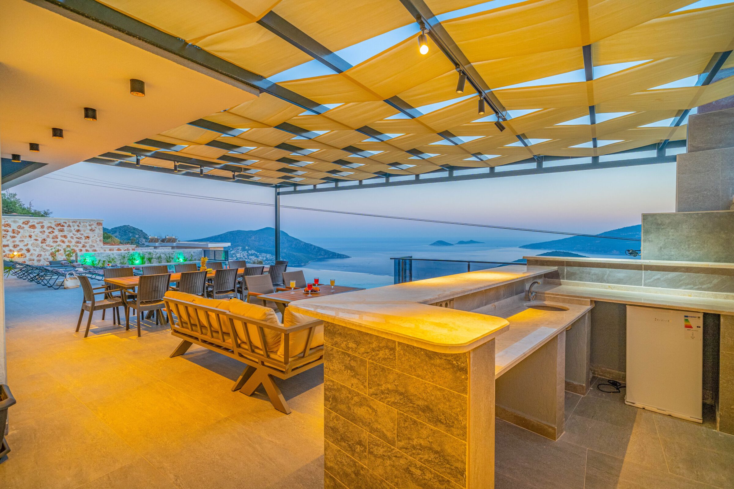 Outdoor dining area and kitchen in Villa Grey Falcon, villas to rent in kalkan, Turkey