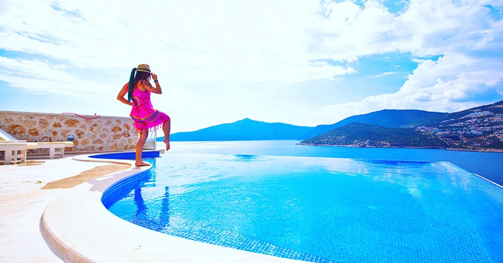 Outdoor pool and sun loungers in Mahumet Salvarli Suites, villa holidays in Kalkan, Turkey