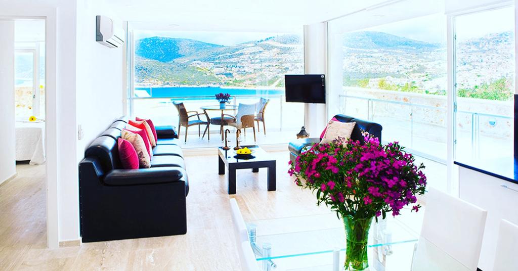 Lounge with balcony access in Mahumet Salvarli Suites, villa holidays in Kalkan, Turkey