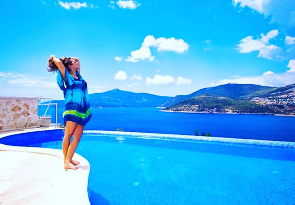 Outdoor pool with sun loungers in Mahumet Salvarli Suites, villa holidays in Kalkan, Turkey