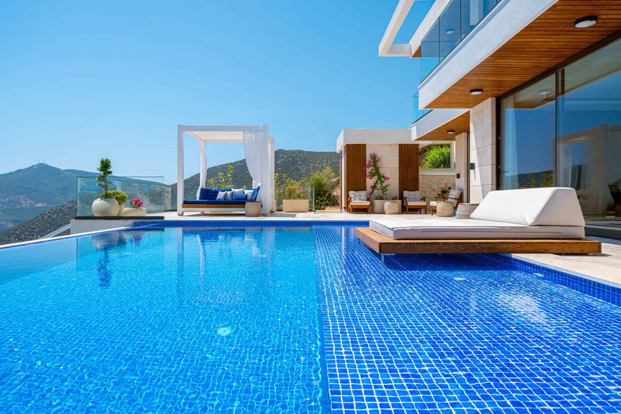 Outdoor infinity pool and sun loungers at Villa Anatolia 1, villas to rent in Kalkan, Turkey