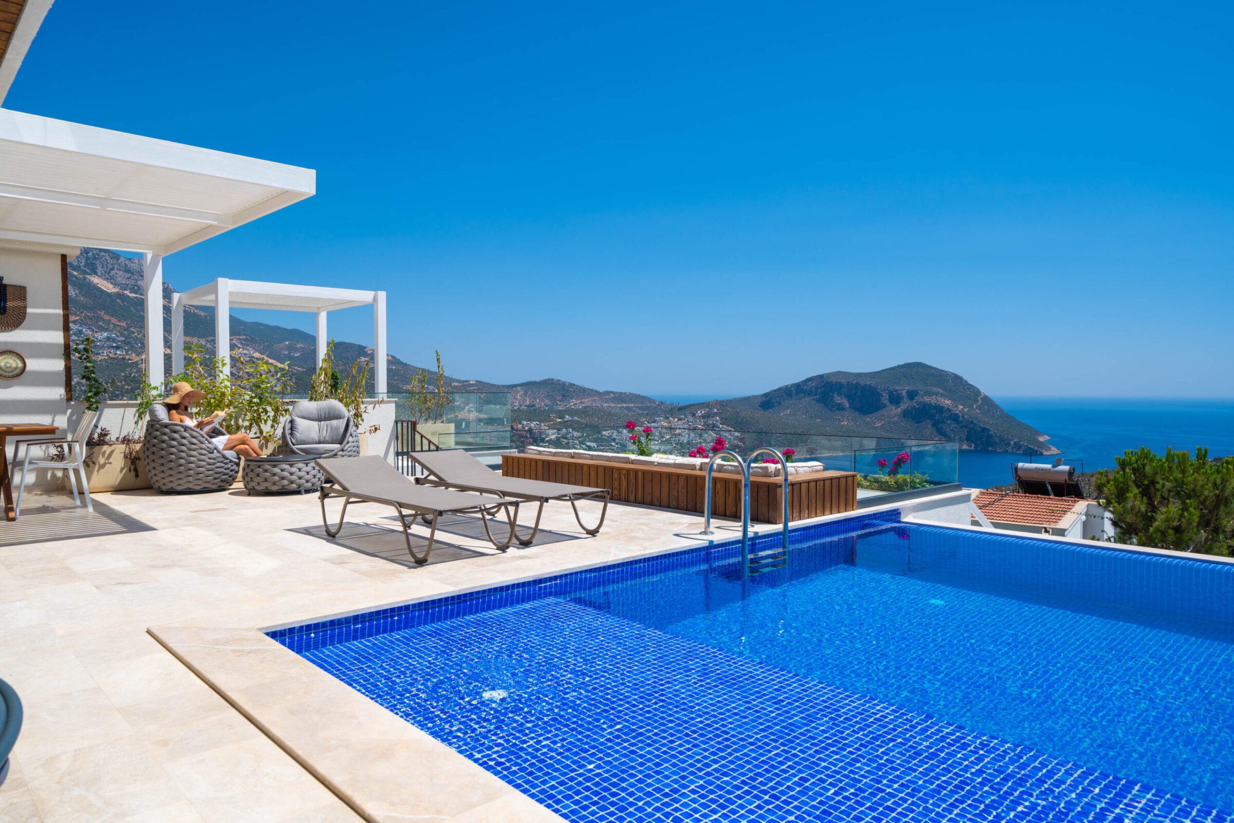 Outdoor infinity pool and sun loungers at Villa Anatolia 1, villas to rent in Kalkan, Turkey