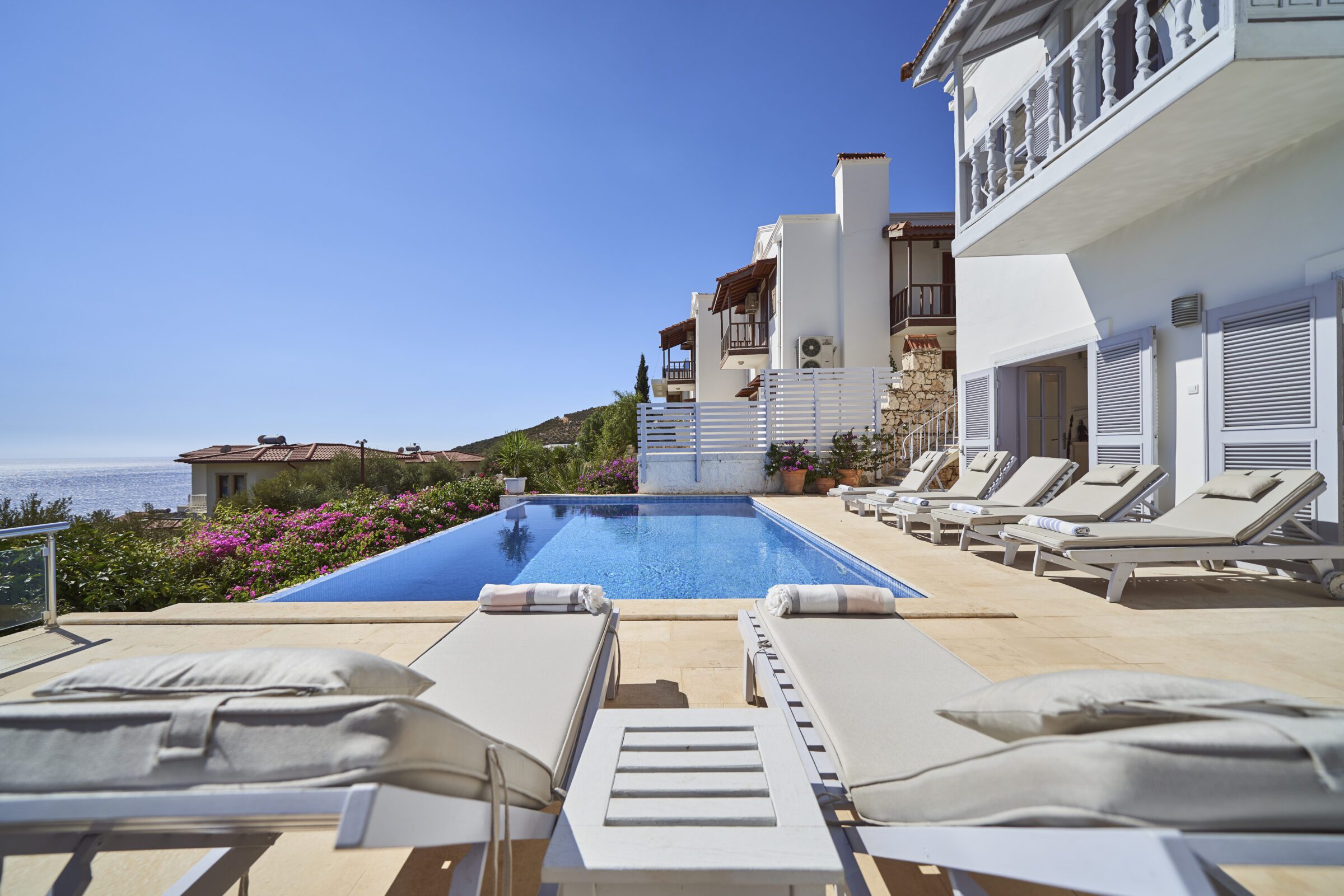 Outdoor pool and sun loungers at Villa Serin Ev, holiday villas in Kalkan, Turkey