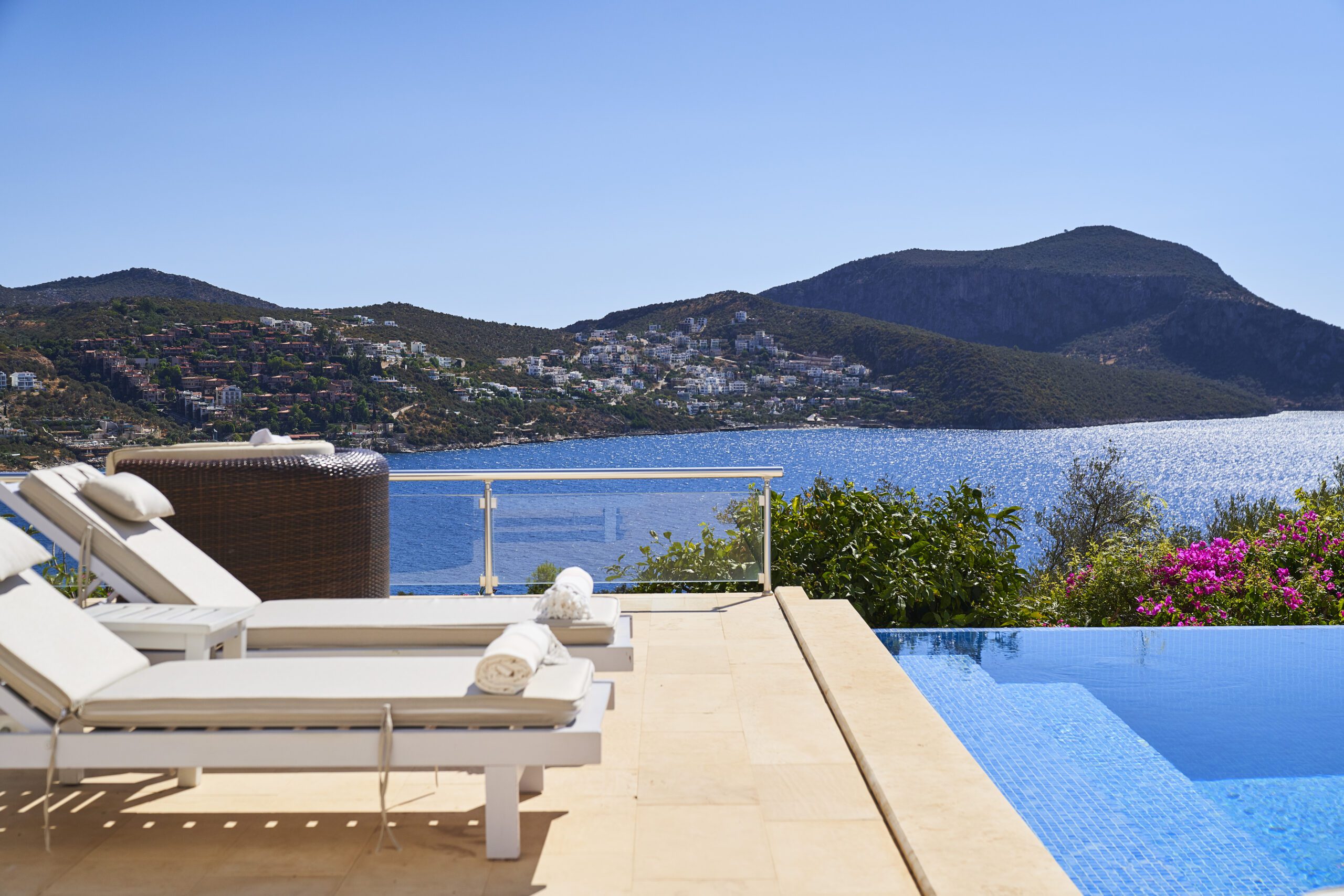 Outdoor pool and sun loungers at Villa Serin Ev, holiday villas in Kalkan, Turkey